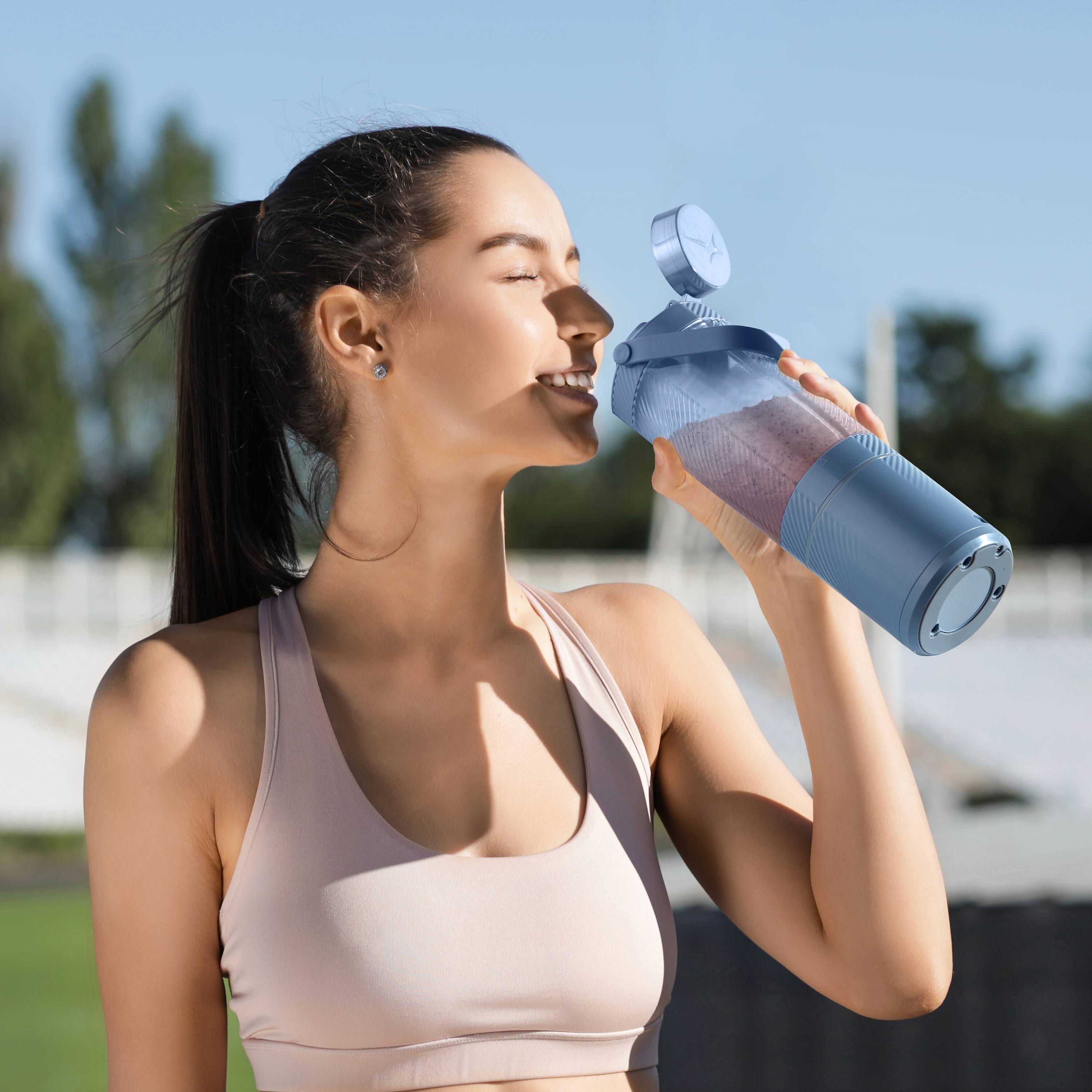 Alt View 1. Oster - GoMax 20oz Portable Blender, Anti-Jam Reversible Blade, Detachable Travel Cup - Morning Haze Blue.