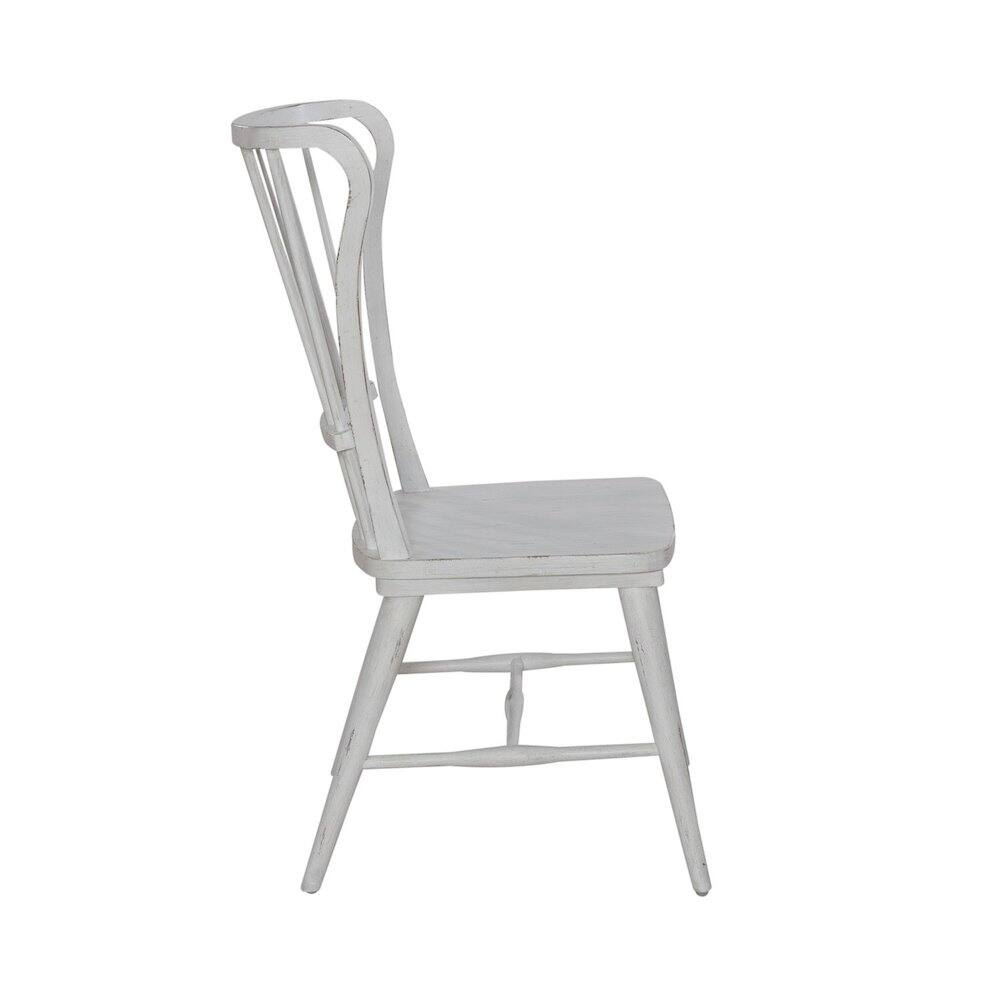 Angle. Liberty Furniture Industries - River Place Windsor Back Side Chair (RTA) - Set of 2 in Pine Solids & Veneers - Riverstone White & Tobacco.