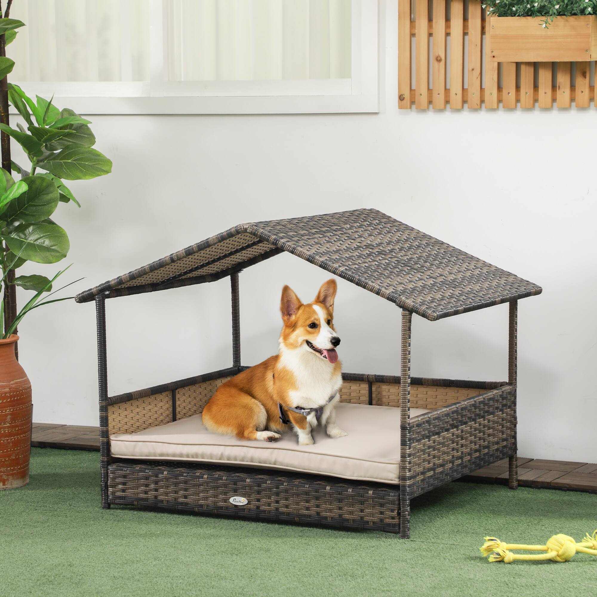 Angle. Pawhut - Wicker Dog House Outdoor, Canopy, Rattan Bed, Water-resistant Cushion, 66 lbs, 19.75", Brown Wicker, Khaki Cushion - Khaki.