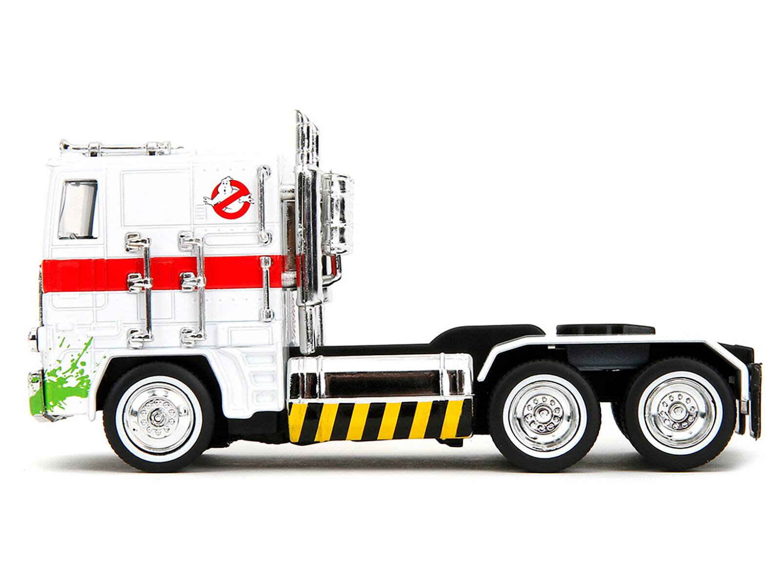 Angle. Jada - G1 Autobot Optimus Prime White Truck with Robot on Chassis Transformers x Ghostbusters 1984 Hollywood Rides Series - White.