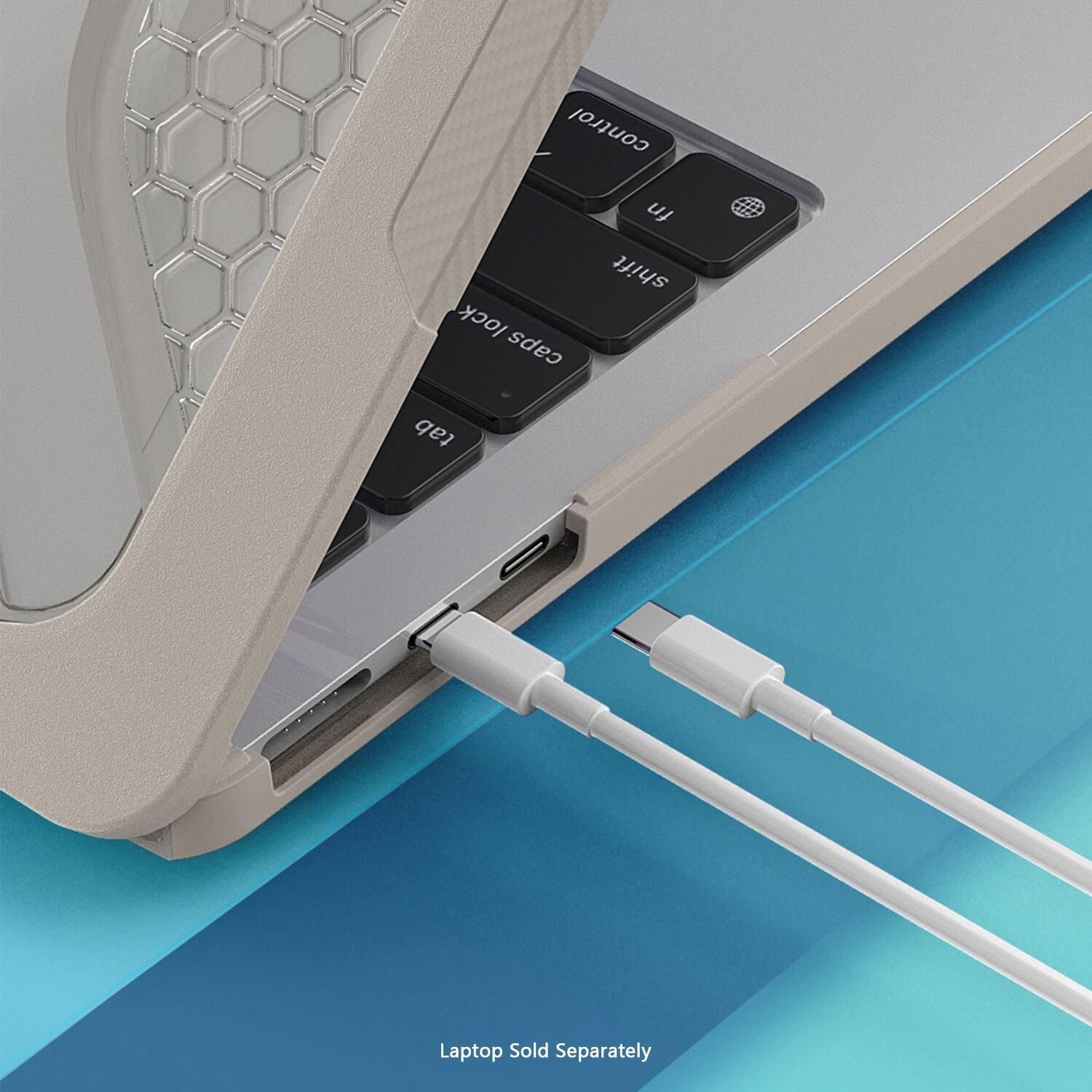 The image shows a laptop with its keyboard open, revealing the control, lock, caps lock, fn, shift, and tab keys. The laptop is connected to a charger, indicating that it is being charged. The text "Laptop Sold Separately" suggests that the laptop itself is not included in the image, but rather the keyboard and charger are being showcased.