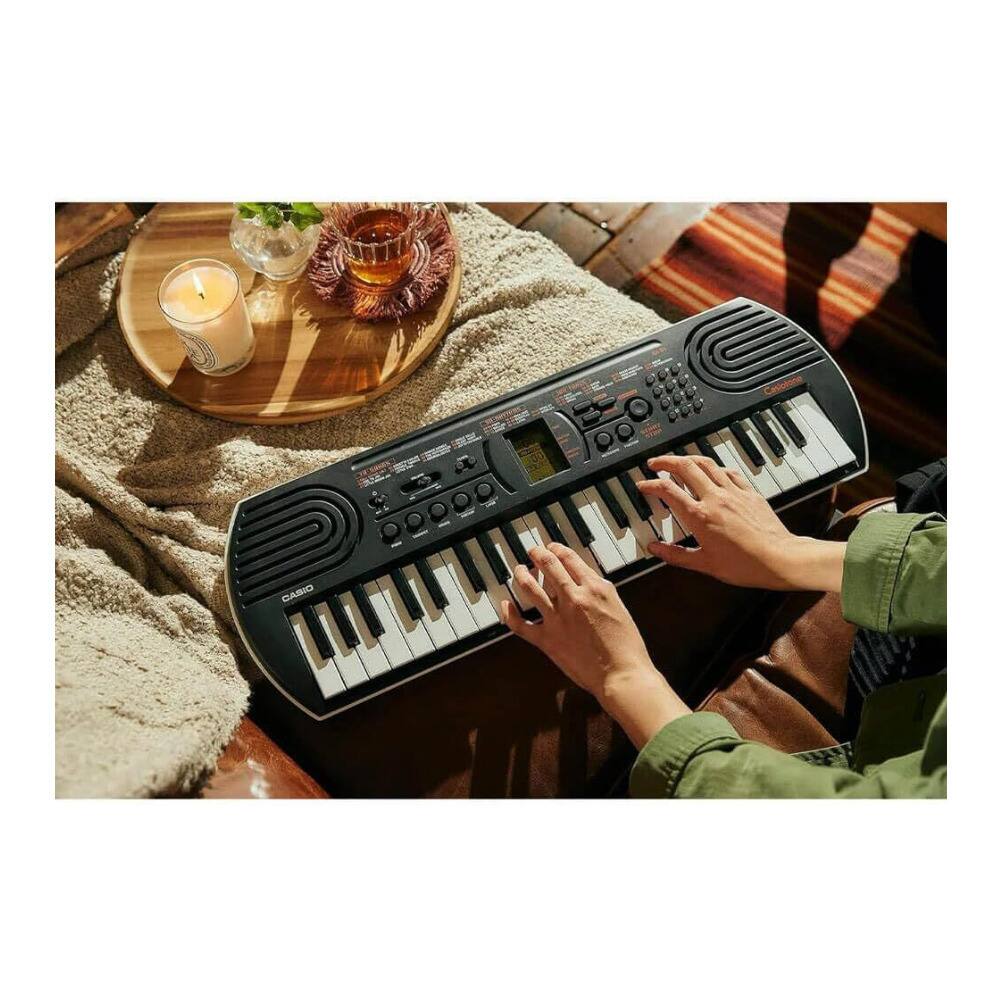 Back. Casio - Casio Casiotone SA-81 Compact Keyboard 44 key with 100 Tones and 50 Rhythms.