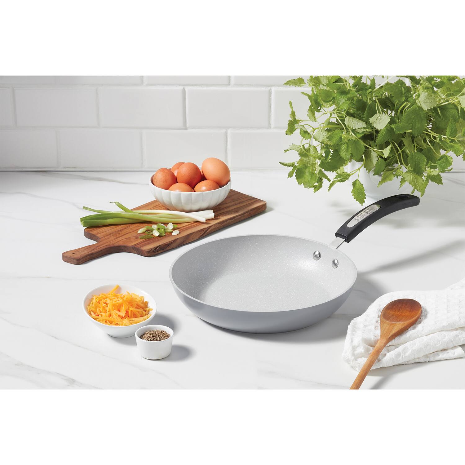 Left. THE ROCK by Starfrit - Terra 10" Ceramic Non-Stick Fry Pan - Gray.