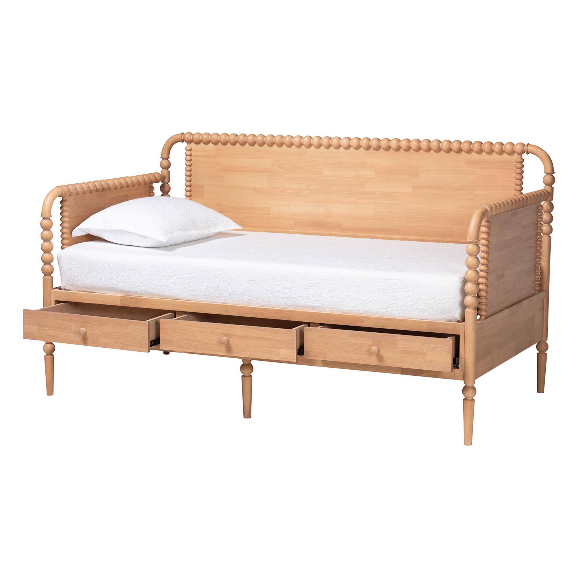 Angle. Baxton Studio - Lucera 3-Drawer Daybed with Bobbin Frame, Full - Beech Brown.