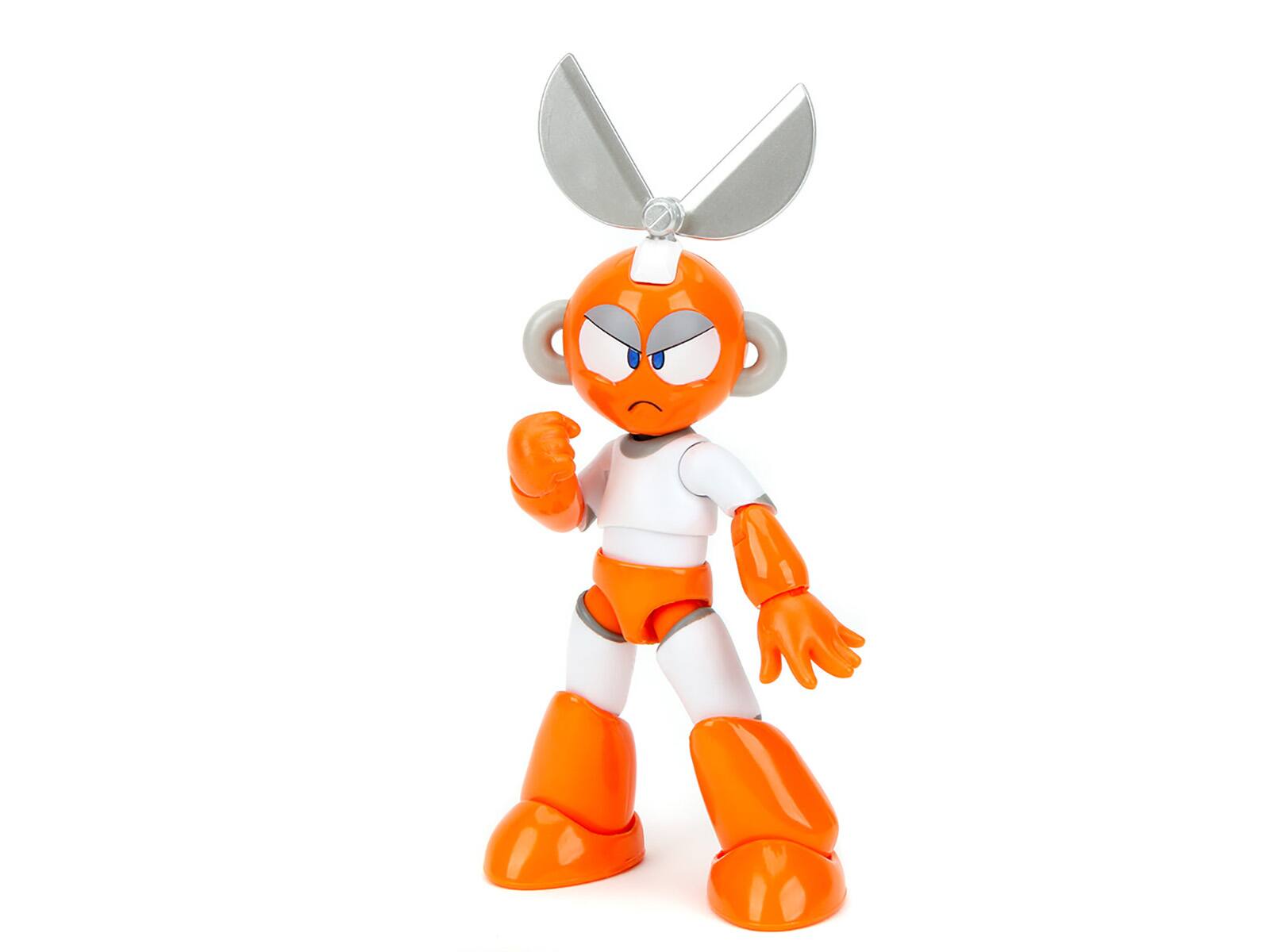 Back. Jada - Cut Man 4.5" Moveable Figure with Accessories and Alternate Head and Hands "Mega Man" (1987) Video Game Model by Jada - White with Orange.