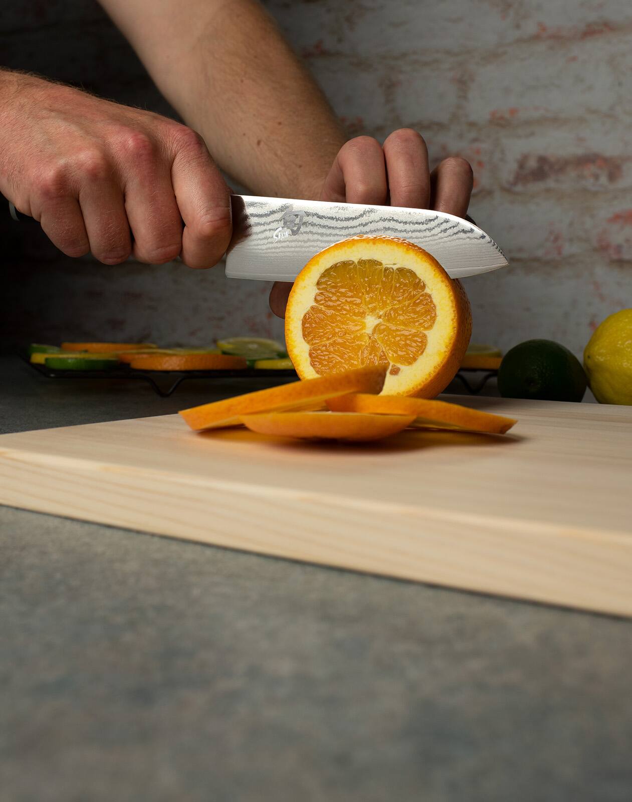 Alt View 4. Shun - Classic Santoku Knife, 5.5 Inch - Black.