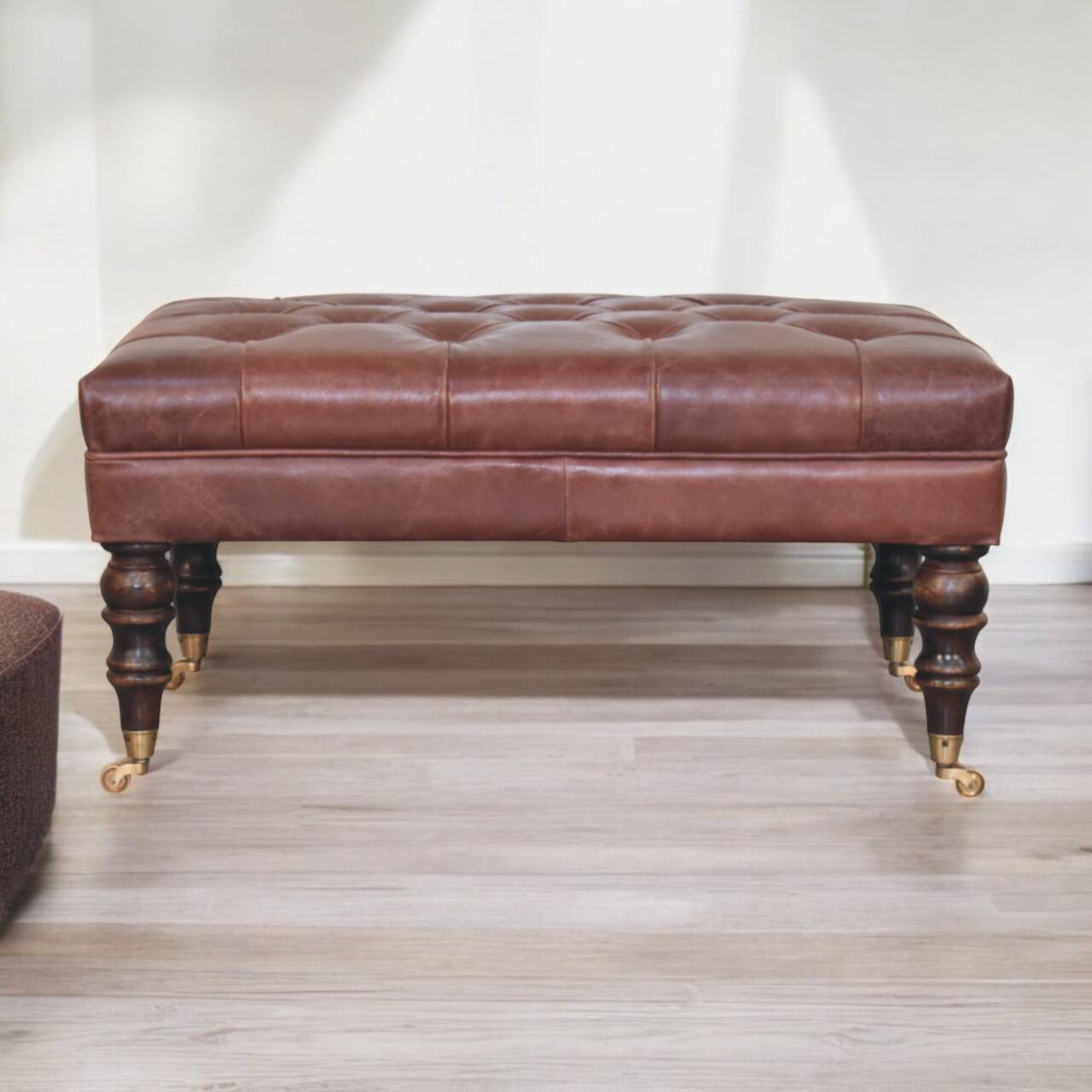 Angle. Artisan Furniture - Artisan Furniture Solid Wood Buffalo Brown Leather Ottoman with Castor Legs, Upholstered - Brown.