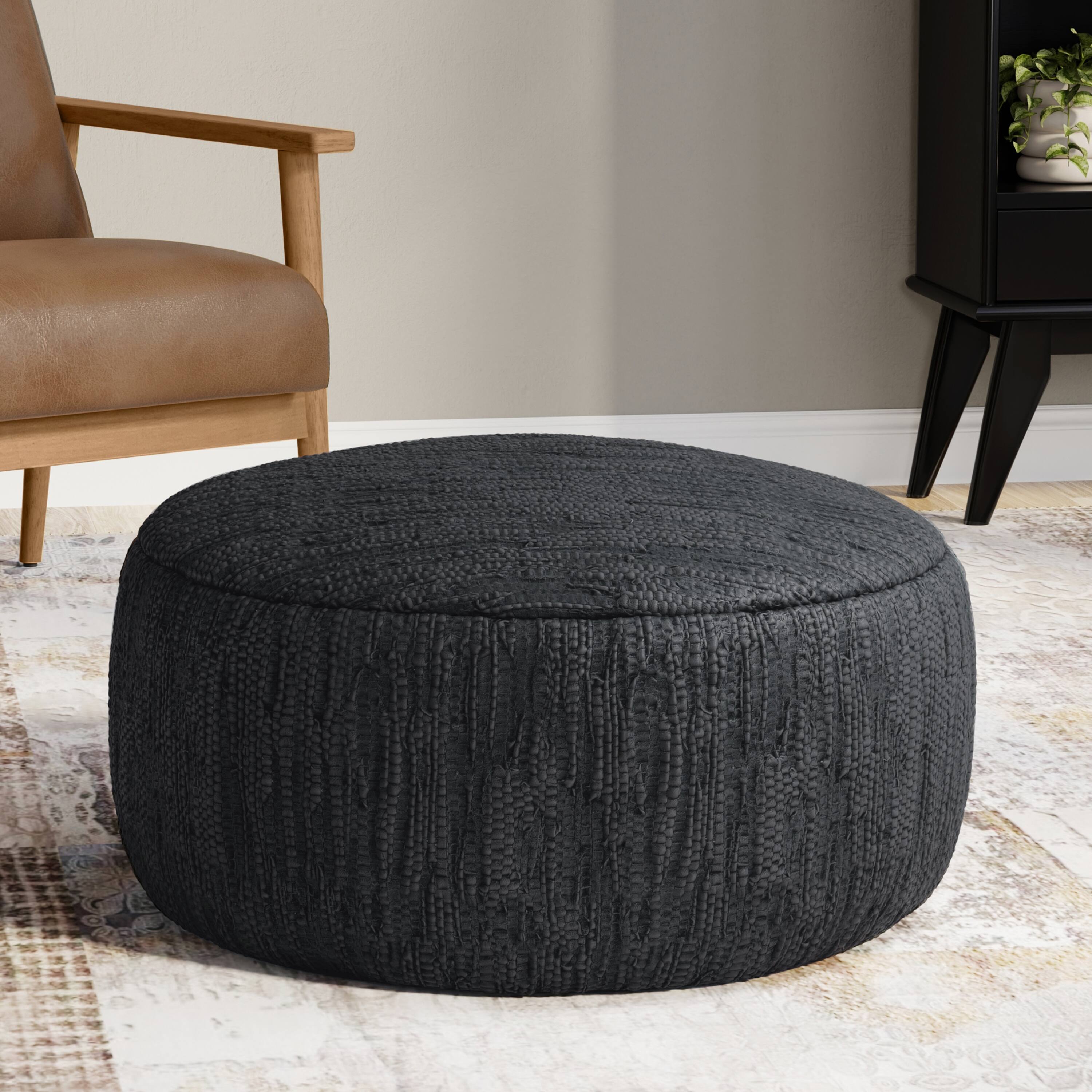 Angle. Simpli Home - Fredrik 30 inch Wide Boho Pouf in Black Genuine Woven Leather, Assembled - Black.