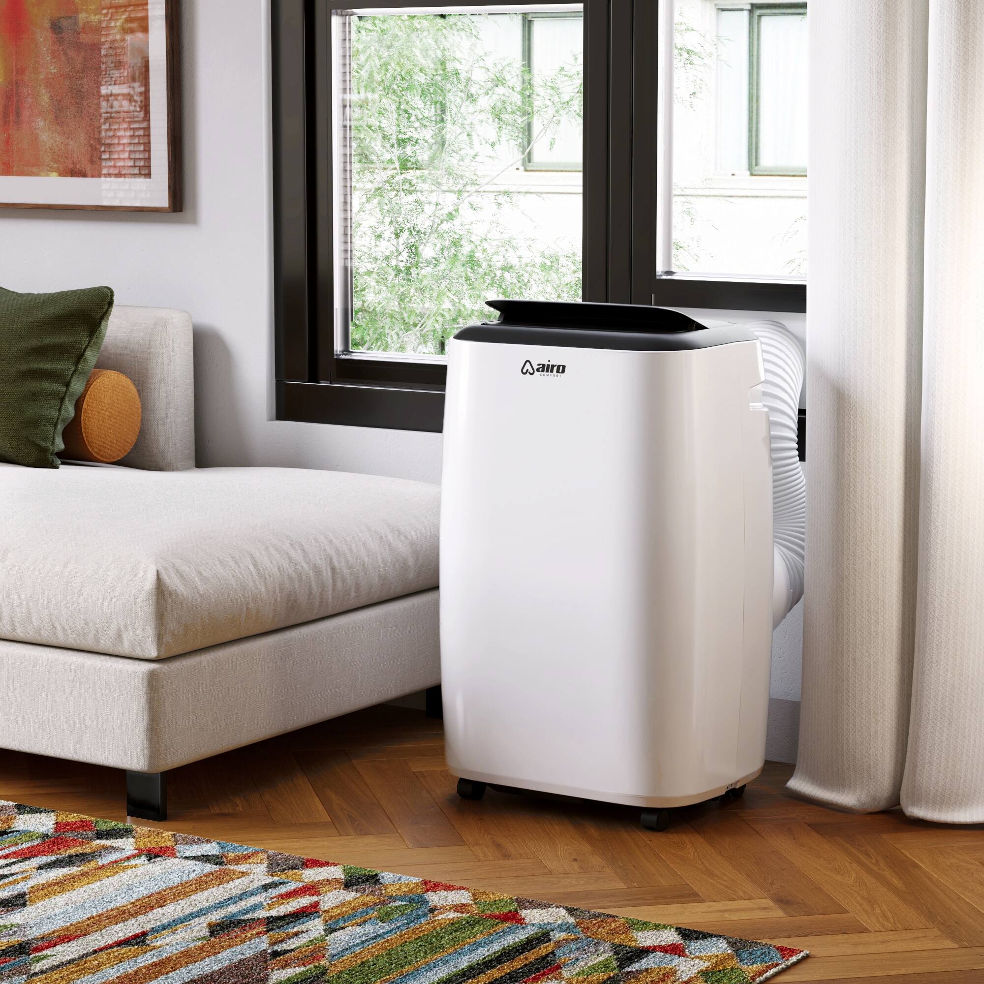 Angle. Airo Comfort - 14,000 BTU Portable Air Conditioner 2026 New Model Cool 700 sq. ft. with Dehumidifier and LCD Remote in White.