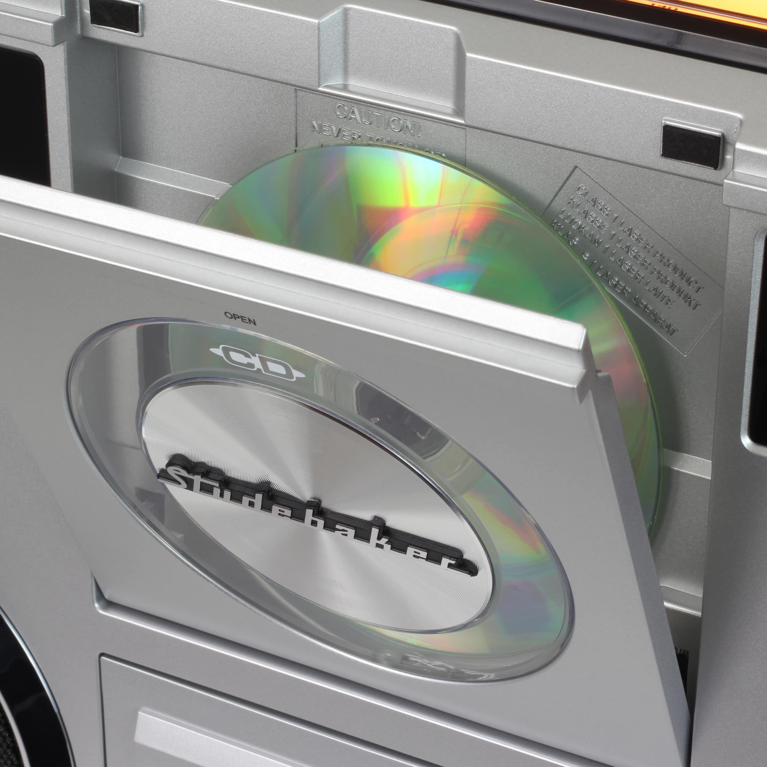 The text on the image reads: "Never Never Caution IA N GogAcr A C0034 Aa da / nos nr N ABER SA2ER LAE otT OPEN CEA CD Studebaker."