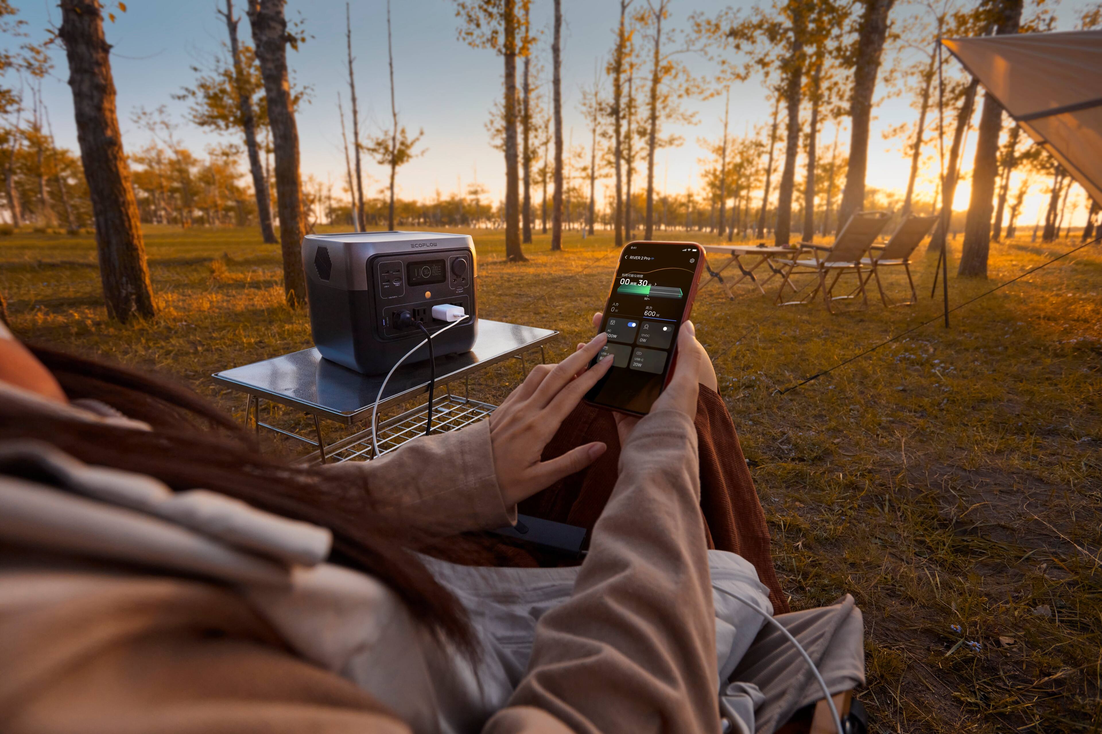 I'm sorry, but I cannot group or correct the text as it appears to be unrelated to the image. The image shows a woman sitting in a chair, holding a cell phone, and there is a microwave nearby. The text seems to be unrelated to the scene and does not provide any context or meaning.