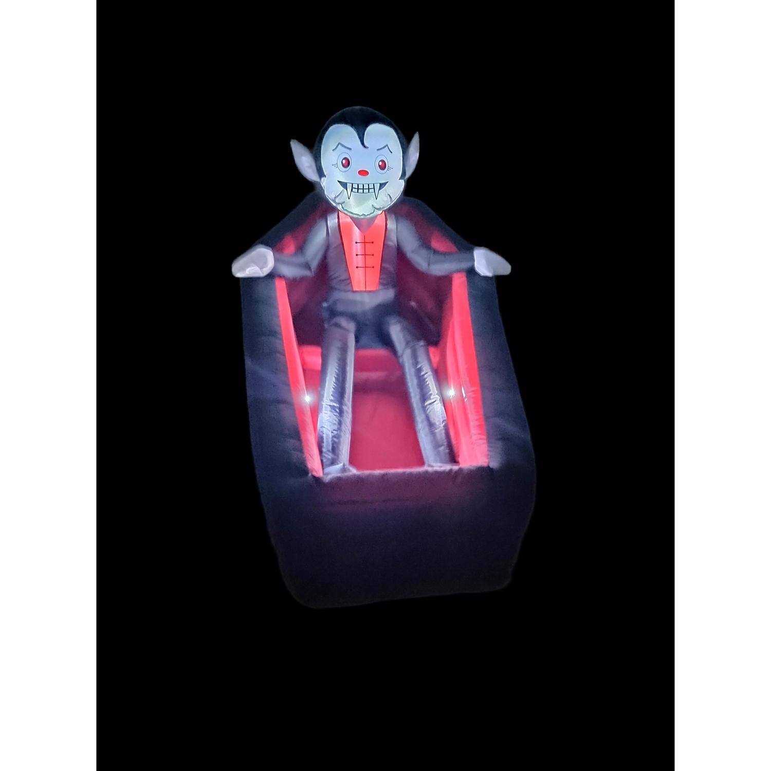 Left. A Holiday Company - A Holiday Company 6 ft. LED Animated Rising Vampire in Coffin Inflatable - Multicolored.