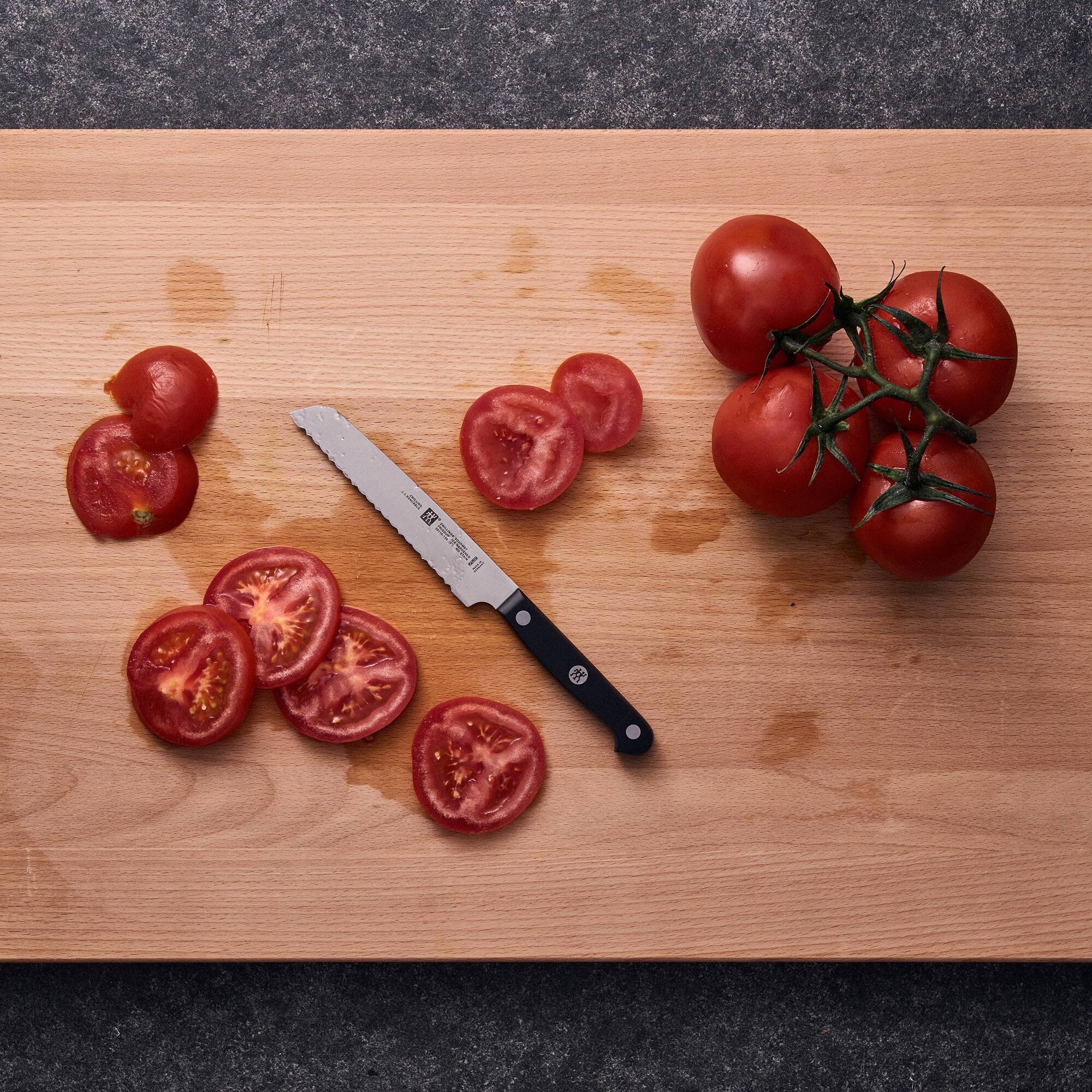 Alt View 3. ZWILLING - ZWILLING Gourmet 5-inch Z15 Serrated Utility Knife - Black.