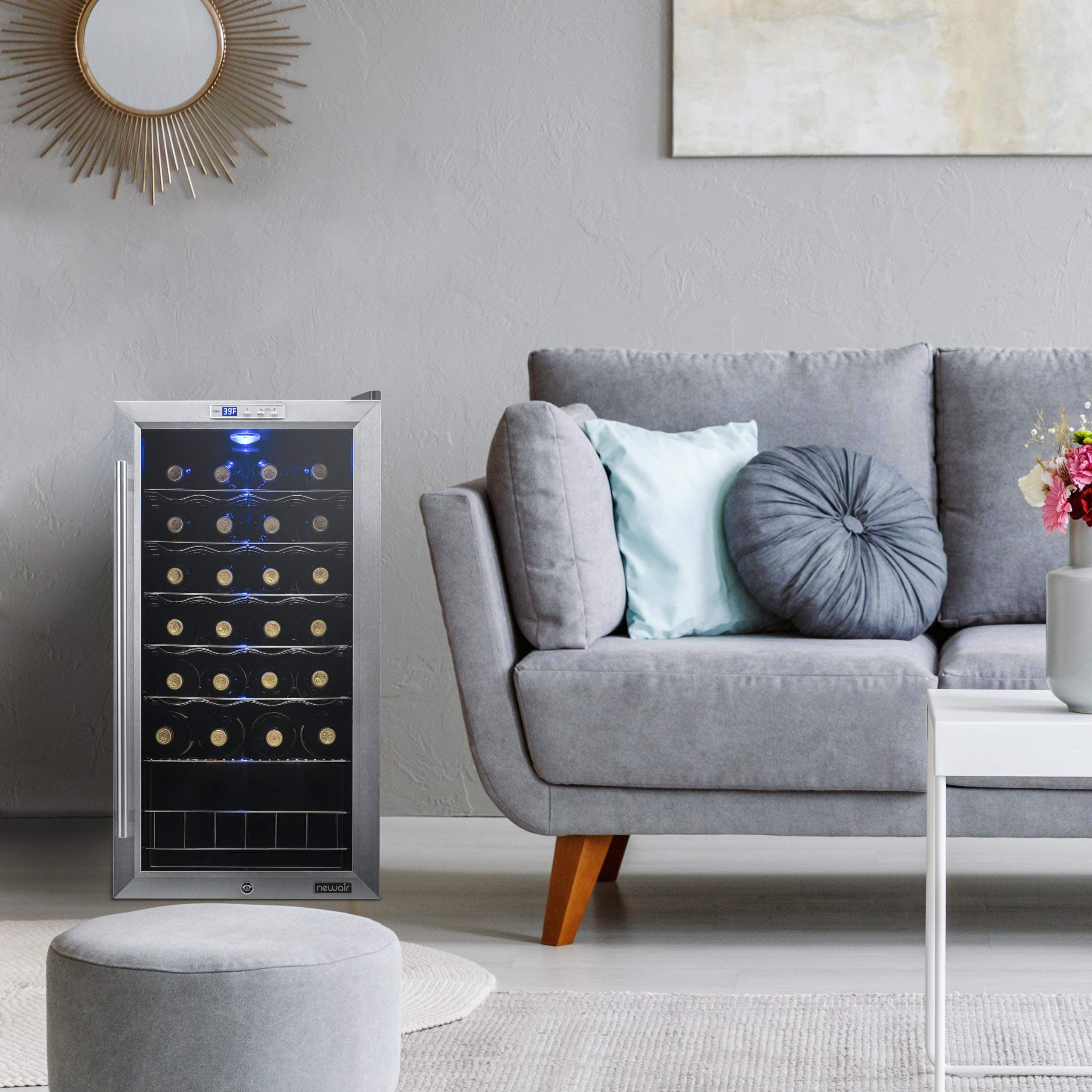 Angle. NewAir - 27-Bottle Wine Fridge with Adjustable Chrome Racks and Exterior Digital Thermostat - Stainless Steel.