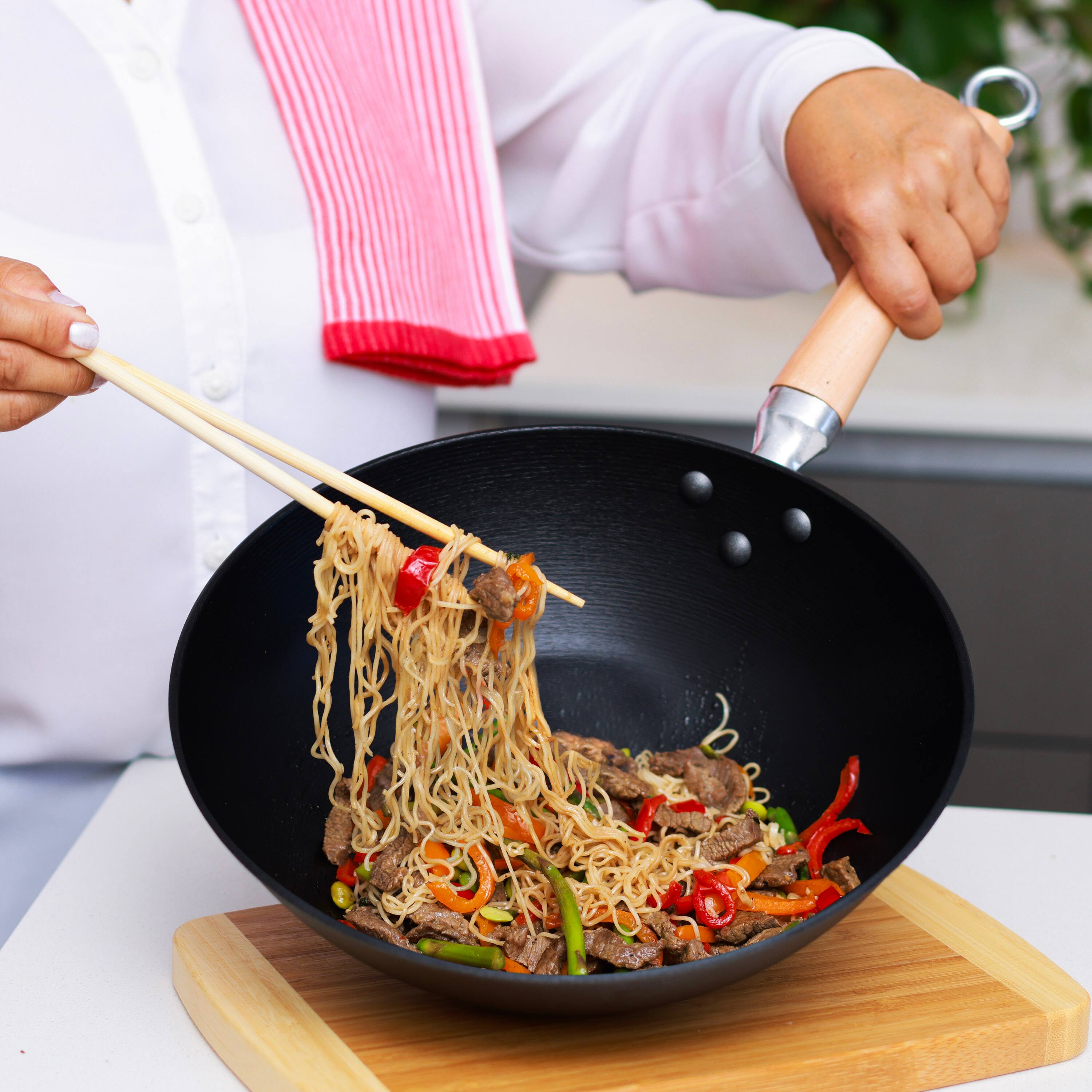 Alt View 2. Escali - Joyce Chen Professional Series 11.5-Inch Preseasoned Cast Iron Stir Fry Pan with Maple Handle - Black.