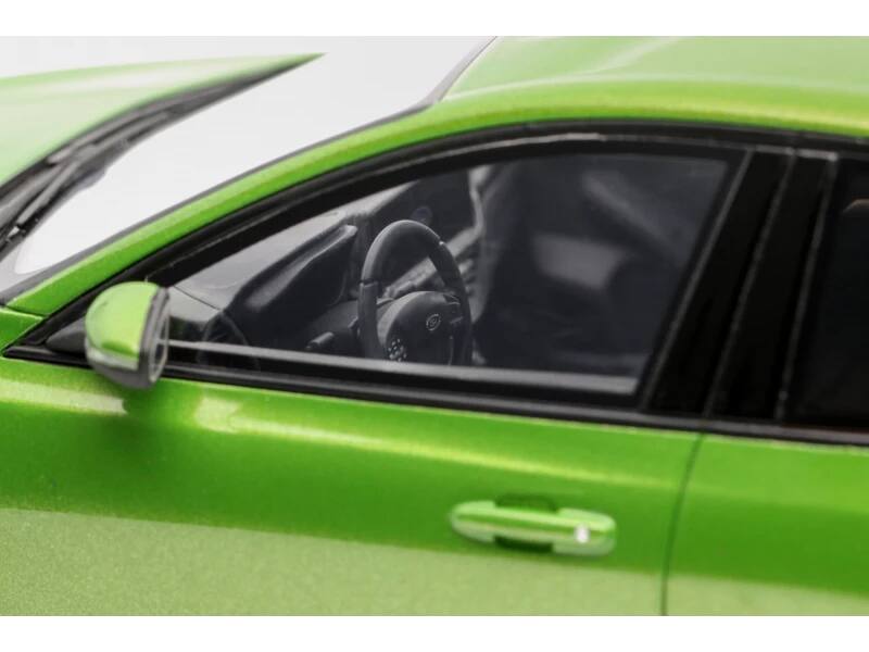 Angle. Otto Mobile - 2022 Ford Focus MK5 ST Phase 2 Mean Green Metallic Limited Edition to 2000 pieces Worldwide 1/18 Model Car - Green Metallic.