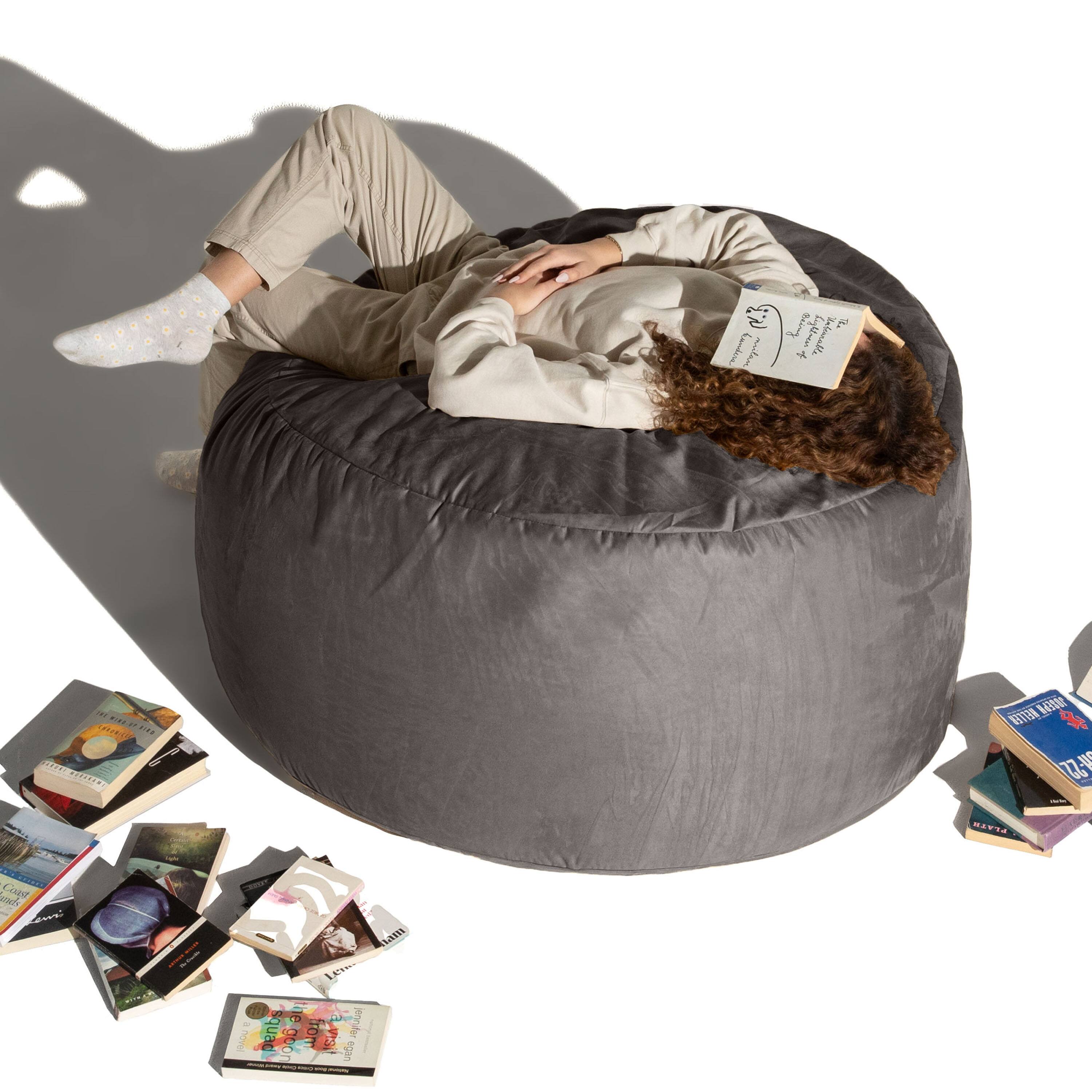 Sure, here is the corrected and grouped text from the image:

**On the book in the person's hand:**
- "The Little Book of Hygge"

**On the books scattered around:**
- "The Little Book of Hygge"
- "The Little Book of Lagom"
- "The Little Book of Fika"
- "The Little Book of Lagom"
- "The Little Book of Fika"
- "The Little Book of Lagom"
- "The Little Book of Fika"
- "The Little Book of Lagom"
- "The Little Book of Fika"
- "The Little Book of Lagom"
- "The Little Book of Fika"
- "The Little Book of Lagom"
- "The Little Book of Fika"
- "The Little Book of Lagom"
- "The Little Book of Fika"
- "The Little Book of Lagom"
- "The Little Book of Fika"
- "The Little Book of Lagom"
- "The Little Book of Fika"
- "The Little Book of Lagom"
- "The Little Book of Fika"
- "The Little Book of Lagom"
- "The Little Book of Fika"
- "The Little Book of