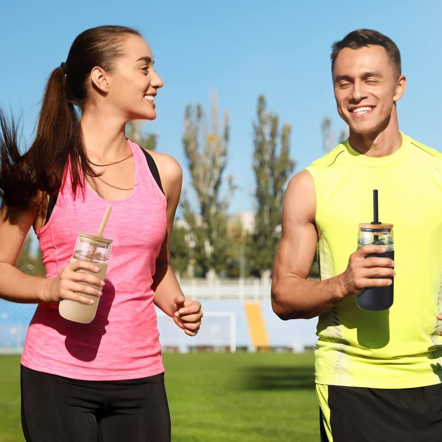 Left. PARKER SLATER - 20oz glass cups with bamboo lids, straws, and silicone sleeves, set for iced coffee, smoothies, boba, or water. - Amber Black.