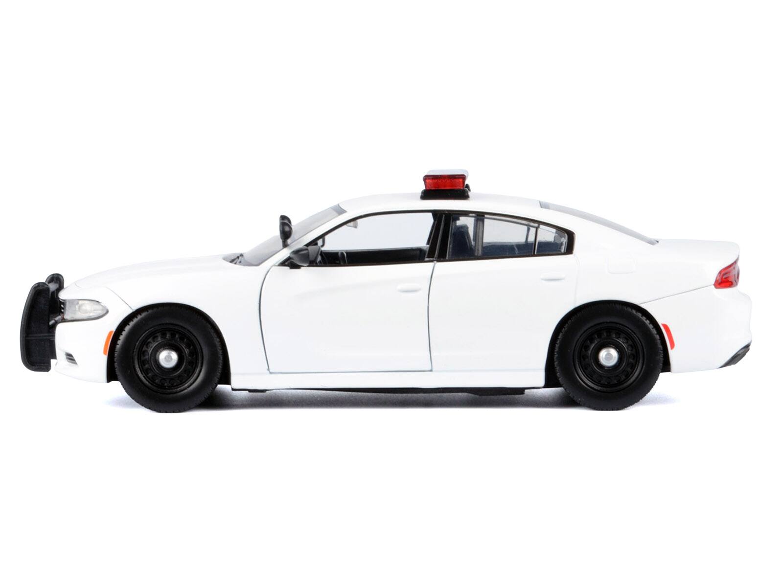 Alt View 1. Motormax - 2023 Dodge Charger Pursuit Police Car Unmarked White w/Light Bar Front & Rear Lights & Sounds 1/24 Model Car by Motormax.