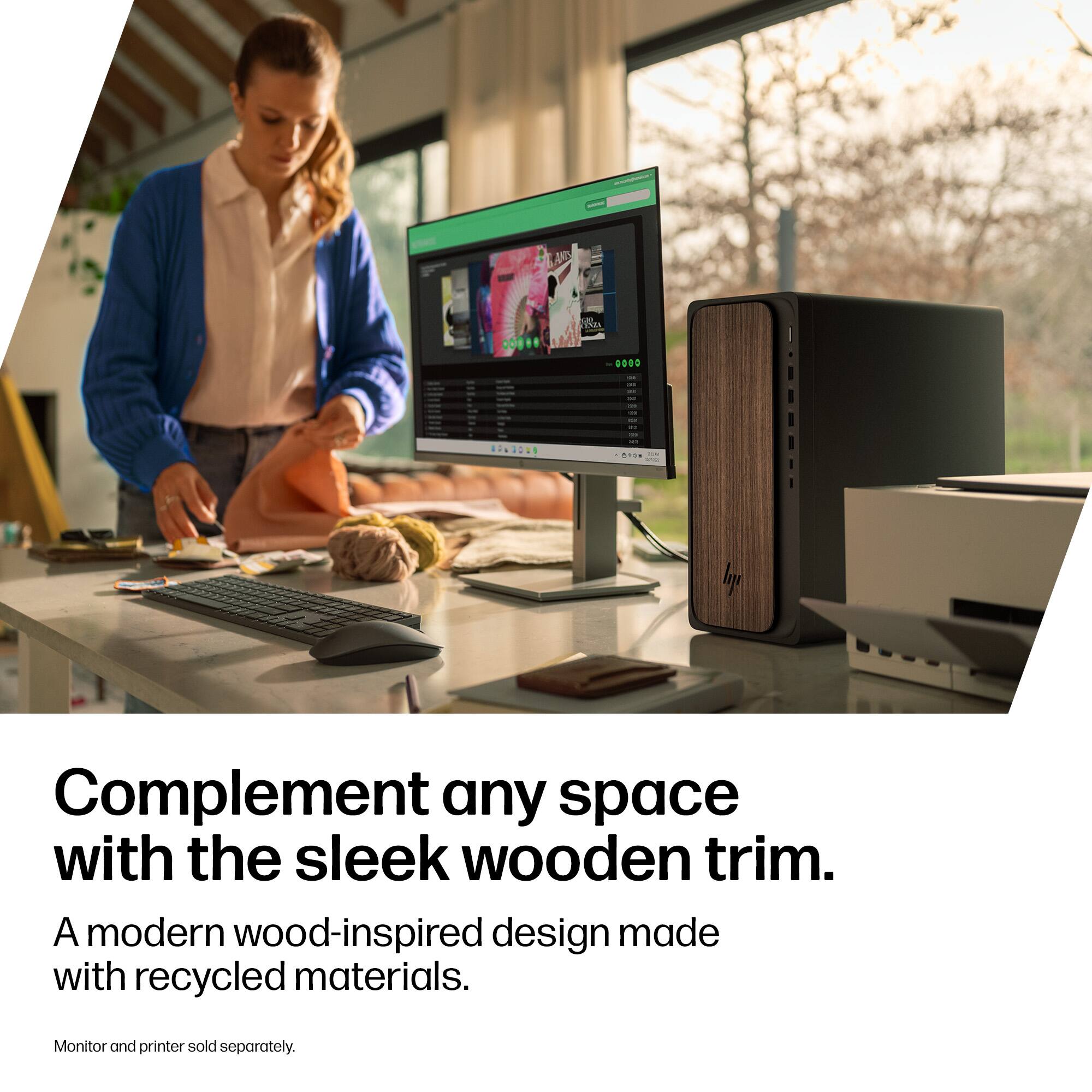 Complement any space with the sleek wooden trim.

A modern wood-inspired design made with recycled materials.

Monitor and printer sold separately.