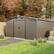 Back. Mondawe - 10x12 FT Outdoor Storage Shed with Color Steel Plate and Two Daylight Windows - Brown.