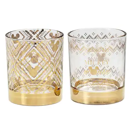 Certainly! Here is the corrected and grouped text from the image:
**Left Glass:**
- V 98
- MOUSA TO00A 0
- I 2002R
- J
- .bs boddda
- 0d
- MICKEY se
- MICKEY DOK
**Right Glass:**
- MICKEY
- MICKEY