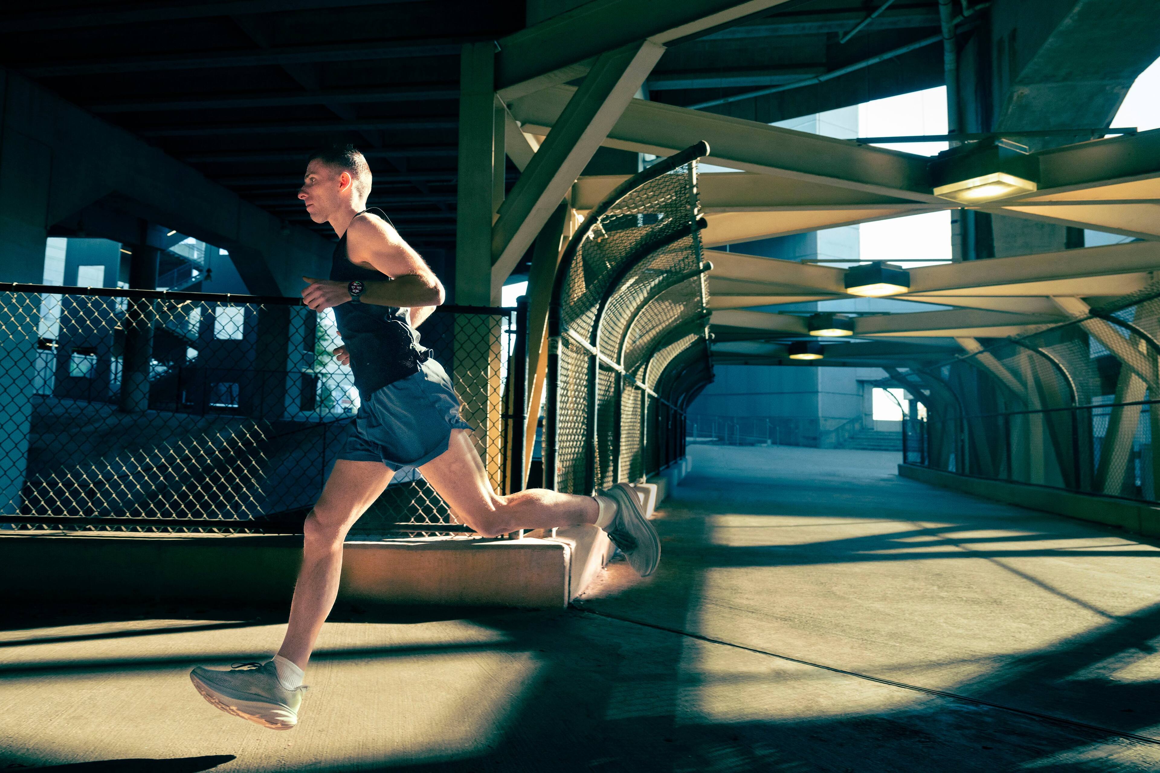 Alt View 8. Garmin - Forerunner 970 GPS Smartwatch 47 mm Titanium - Soft Gold Titanium with French Gray Case.