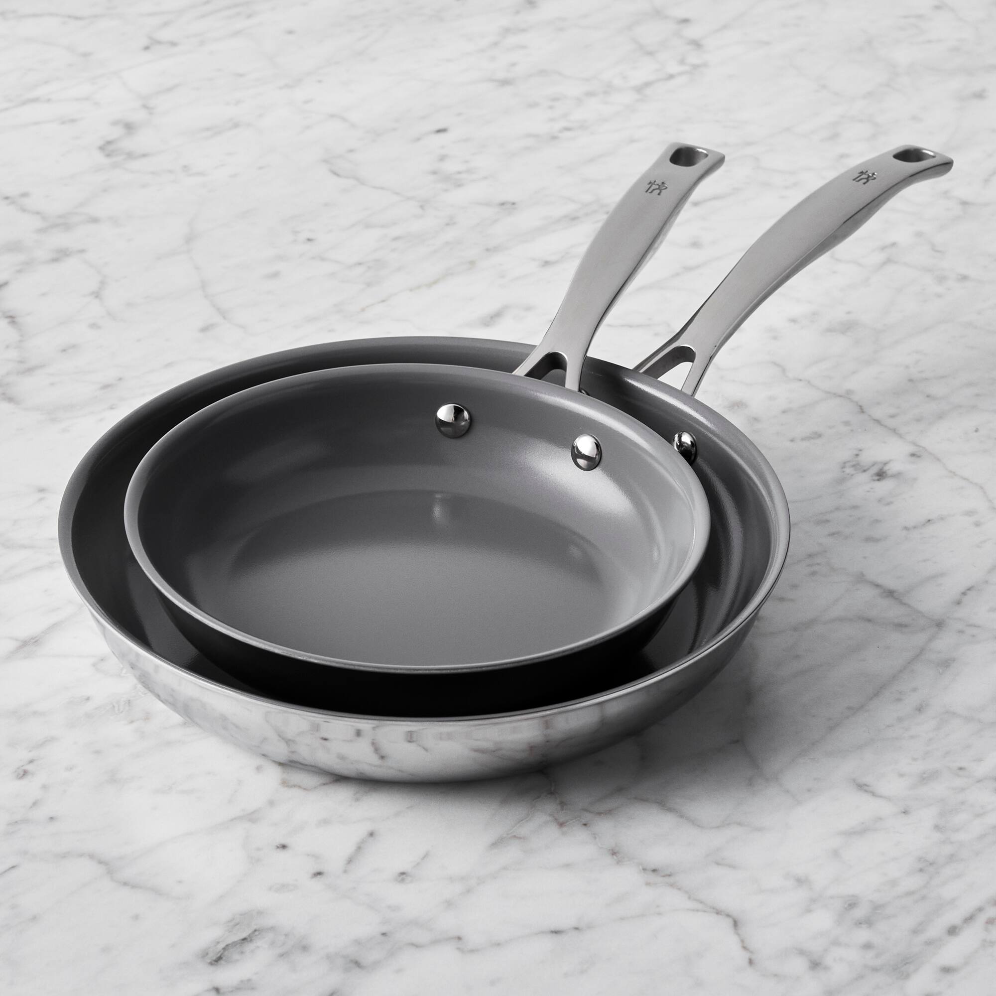 Alt View 1. Henckels - Henckels Clad H3 2-pc Stainless Steel Ceramic Nonstick 8-in & 10-in Fry Pan Set - Stainless Steel.