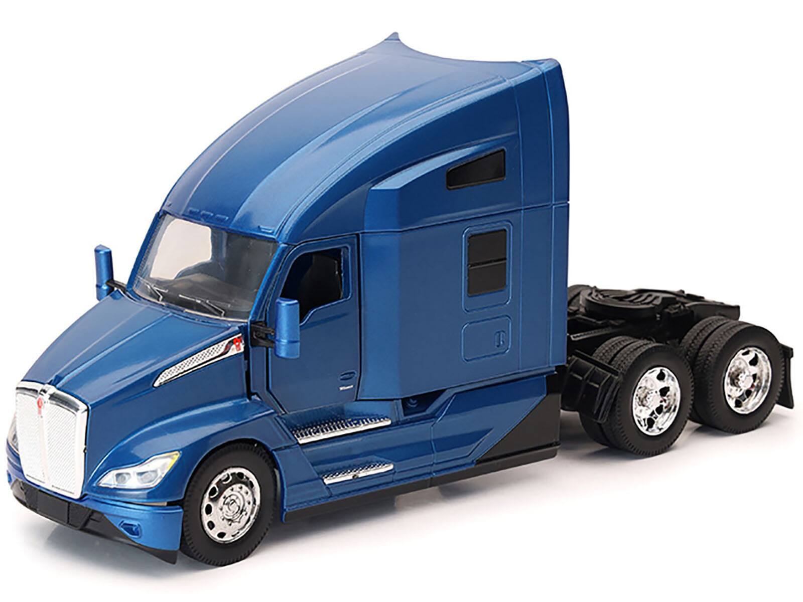 Angle. New Ray - Kenworth T680 Truck Tractor Blue Metallic "Long Haul Truckers" Series 1/32 Diecast Model by New Ray - Blue Metallic.