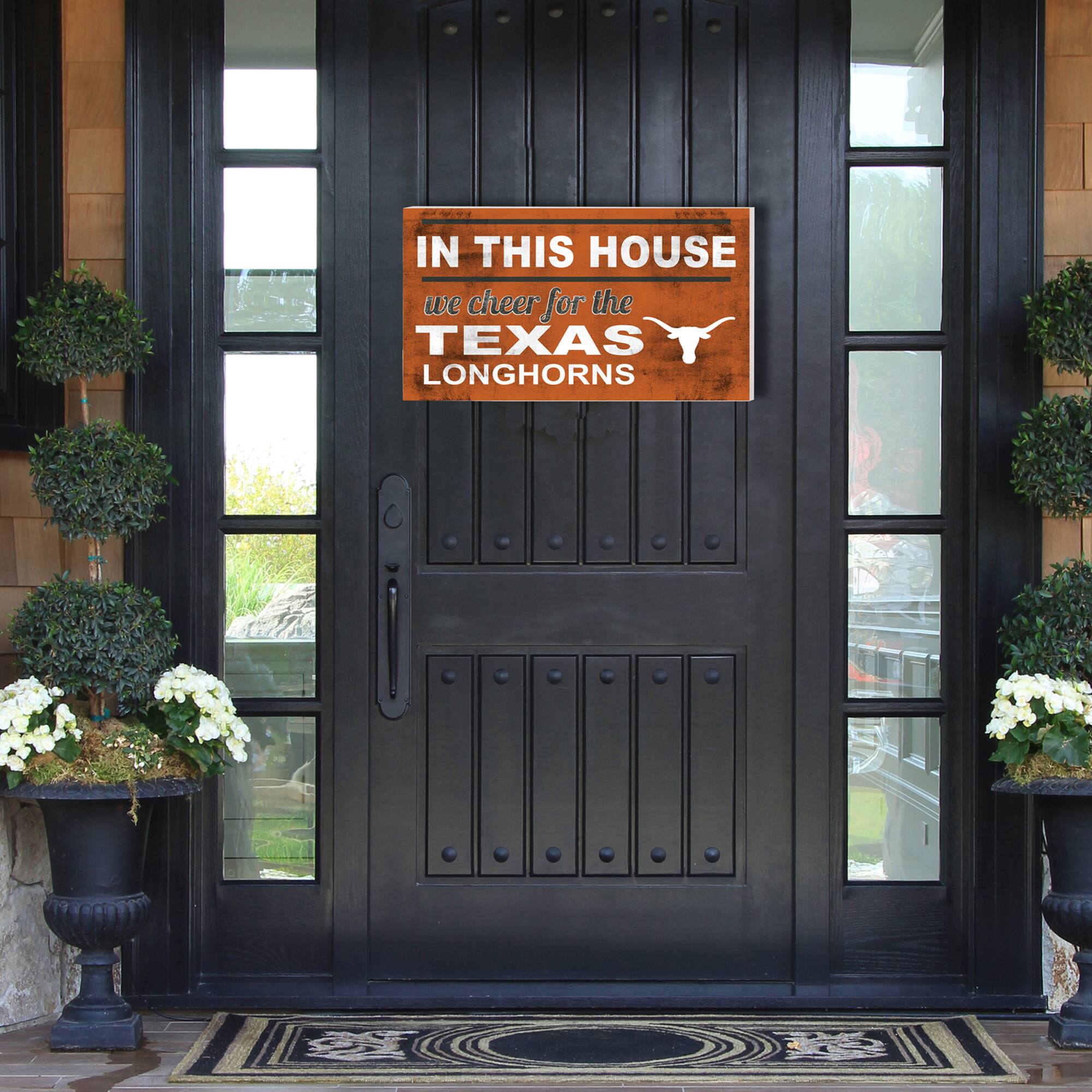 IN THIS HOUSE  
we cheer for the  
TEXAS LONGHORNS