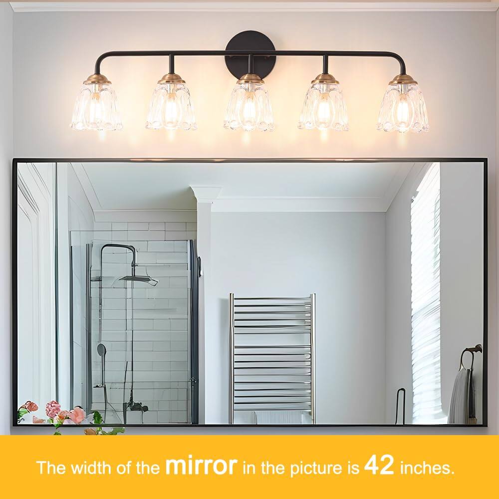 The width of the mirror in the picture is 42 inches.
