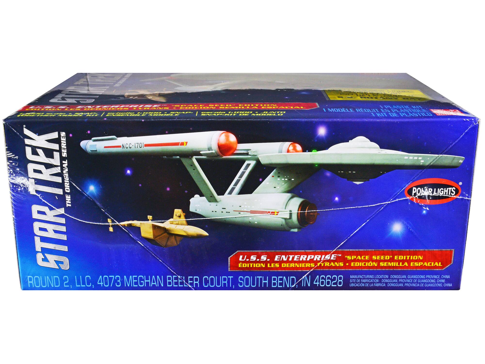 Sure, here is the corrected and grouped text from the image:

---

**STAR TREK**  
THE ORIGINAL SERIES

**U.S.S. ENTERPRISE**  
"SPACE SEED" EDITION  
EDITION LES DERNIERS TYRANS  
EDICIÓN SEMILLA ESPACIAL

**1 PLASTIC KIT**  
1 MODELE RÉDUIT EN PLASTIQUE  
1 KIT DE PLASTICO

**ROUND 2, LLC**  
4073 MEGHAN BEELER COURT, SOUTH BEND, IN 46628

**POLAR LIGHTS**

**MANUFACTURING LOCATION:**  
DONGGUAN, GUANGDONG PROVINCE, CHINA  
SITE DE FABRICATION: DONGGUAN, PROVINCE DE GUANGDONG, CHINE  
UBICACIÓN DE LA FÁBRICA: DONGGUAN, PROVINCIA DE GUANGDONG, CHINA

---

This text is organized to reflect the information on the packaging accurately.