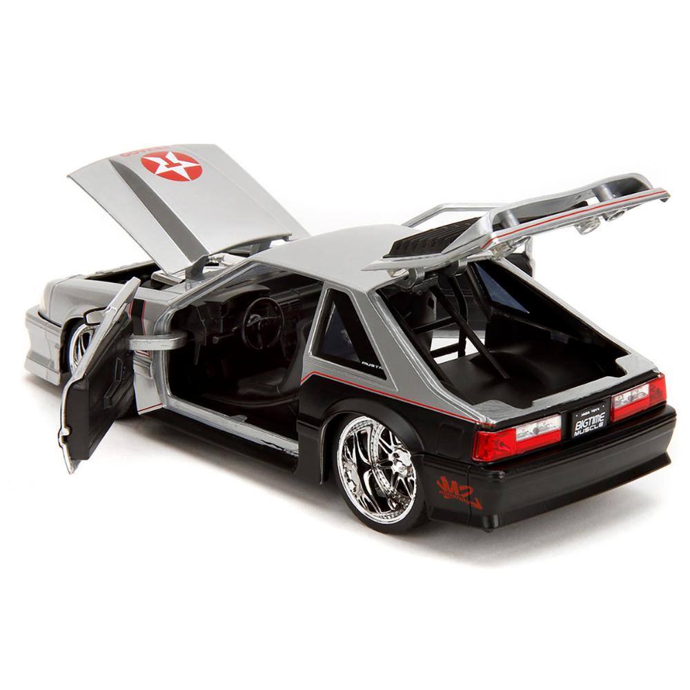 Back. Jada - 1989 Ford Mustang GT "Texaco" Silver Metallic and Matt Black "Bigtime Muscle" Series 1/24 - Silver Metallic and Matt Black.