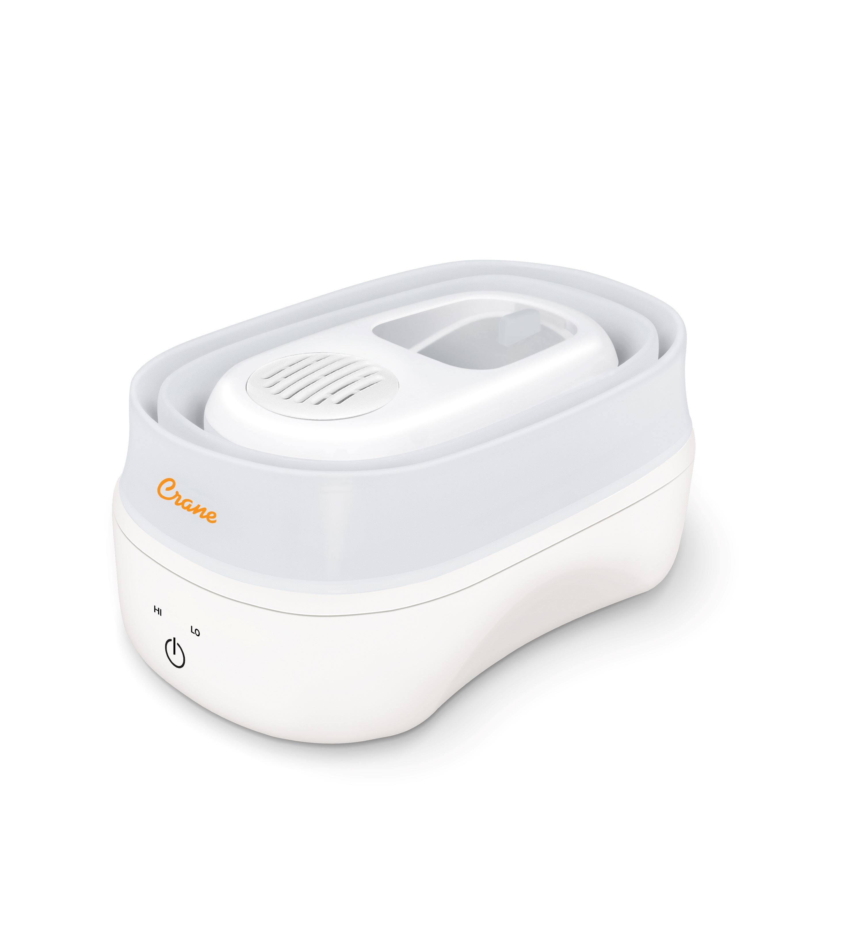 Angle. CRANE - 1 Gal. Warm Mist Collapsible Humidifier, White, Top Fill, for Medium Rooms Up to 500 sq. ft. - White.