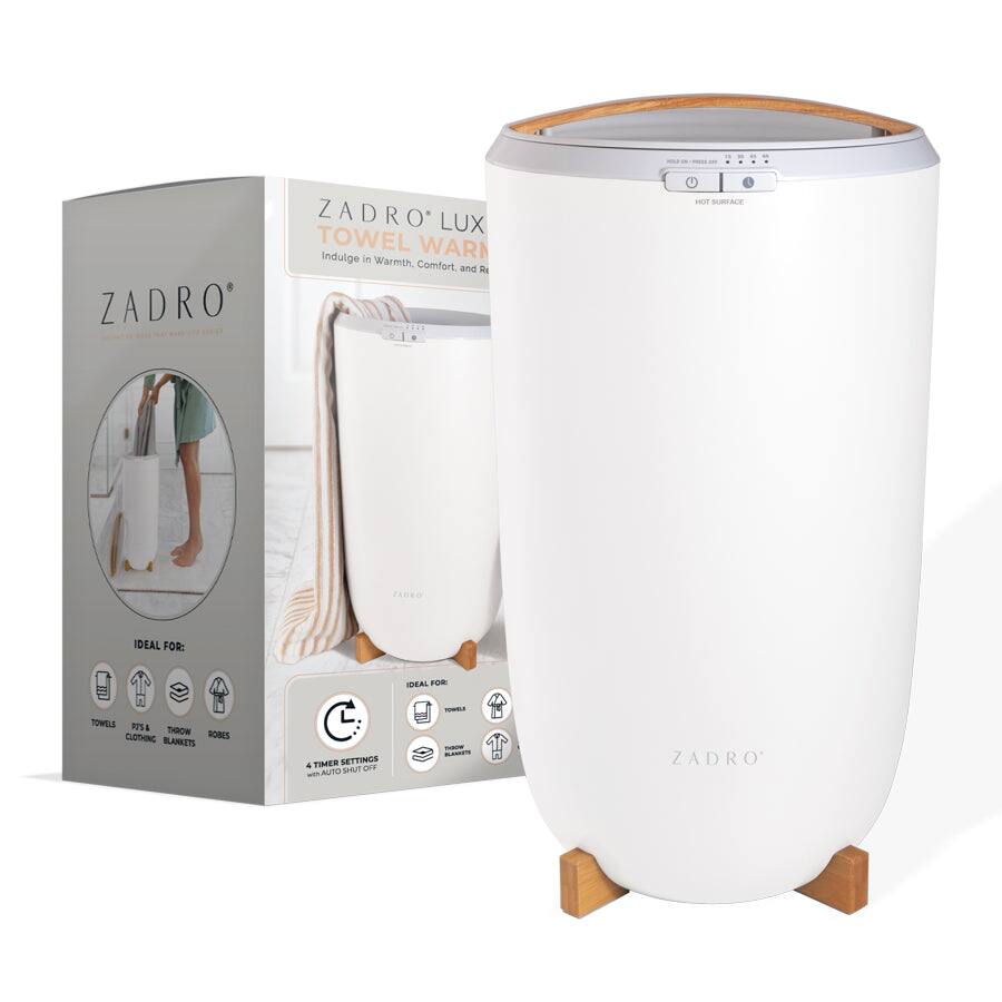 ZADRO LUX TOWEL WARMER  
Indulge in Warmth, Comfort, and Relaxation  

IDEAL FOR:  
TOWELS  
PANTS & THROW BLANKETS  
ROBES  

4 TIMER SETTINGS with AUTO SHUT OFF  

IDEAL FOR:  
TOWELS  
PANTS & THROW BLANKETS  
ROBES  

HOT SURFACE