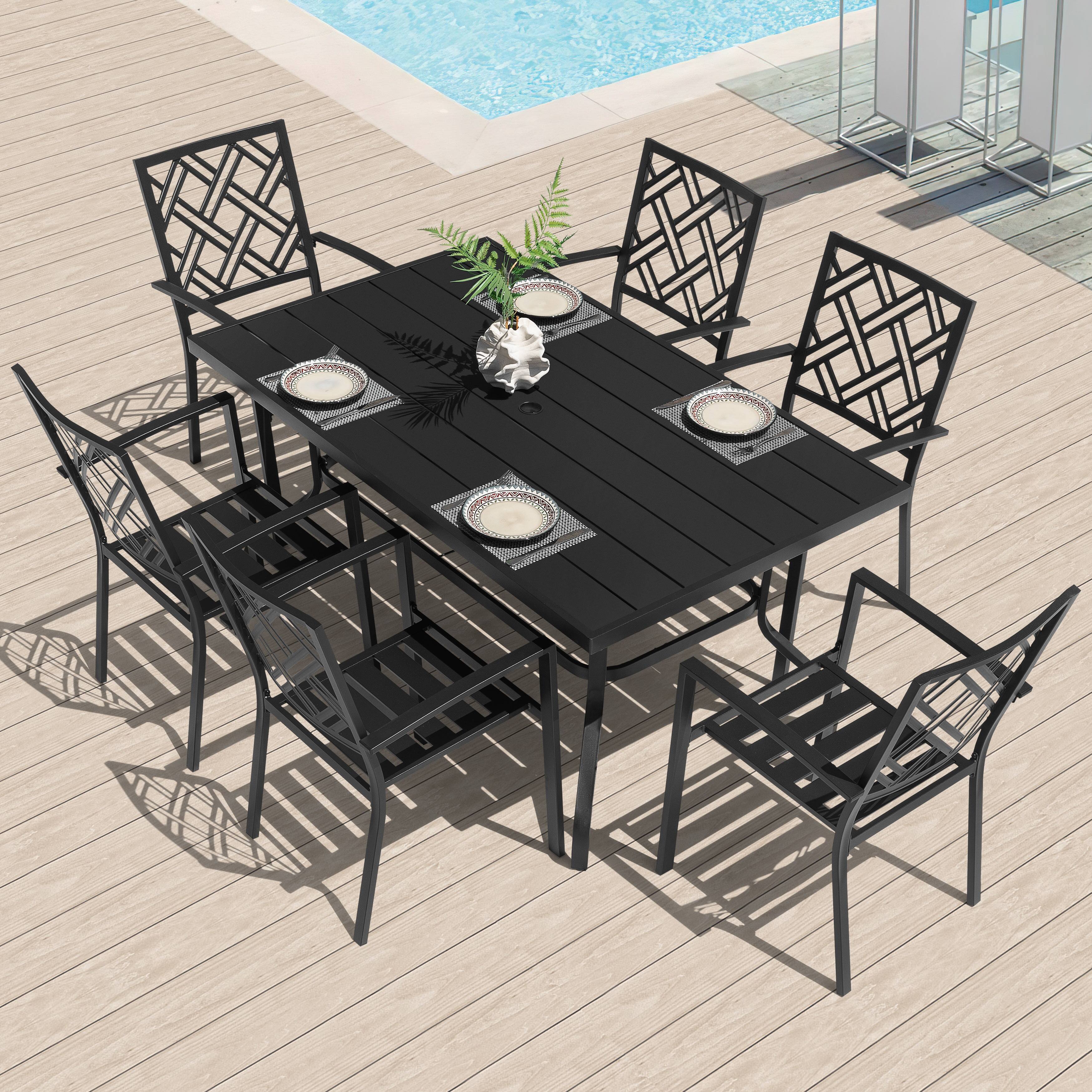 Angle. Nuu Garden - 7-Piece Metal Patio Dining Set with Umbrella Hole and Stackable Chairs - Black.
