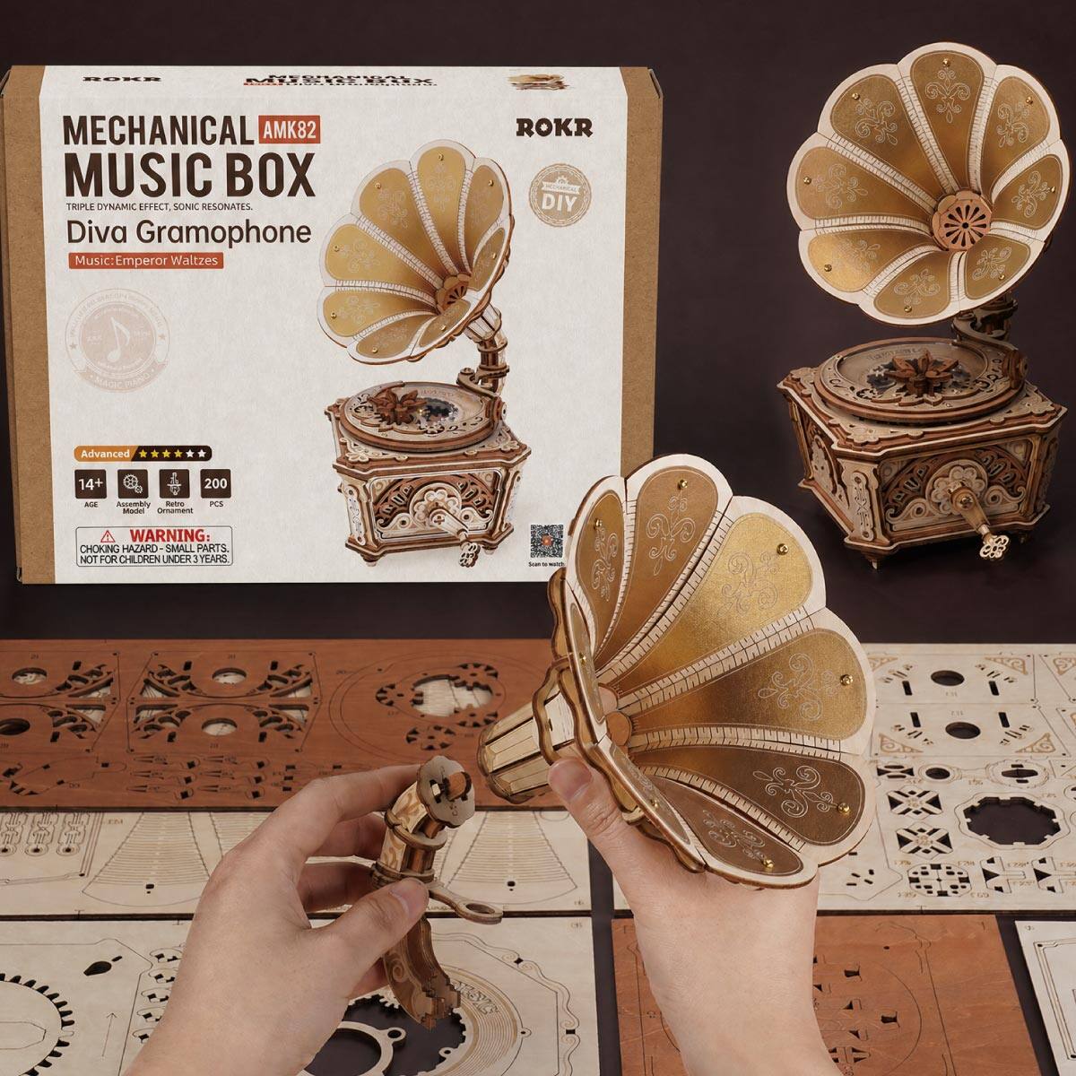 ROKR  
MEGRANGAL - - - - -  
MECHANICAL AMK82 MUSIC BOX TRIPLE DYNAMIC EFFECT, SONIC RESONATES.  
Diva Gramophone Music: Emperor Waltzes  
ROKR DIY  
Advanced  
14+ AGE Assembly Retro PCS Model Ornament  
WARNING: CHOKING HAZARD SMALL PARTS. NOT FOR CHILDREN UNDER 3 YEARS.  
Ican  
10%  
89  
ess  
25