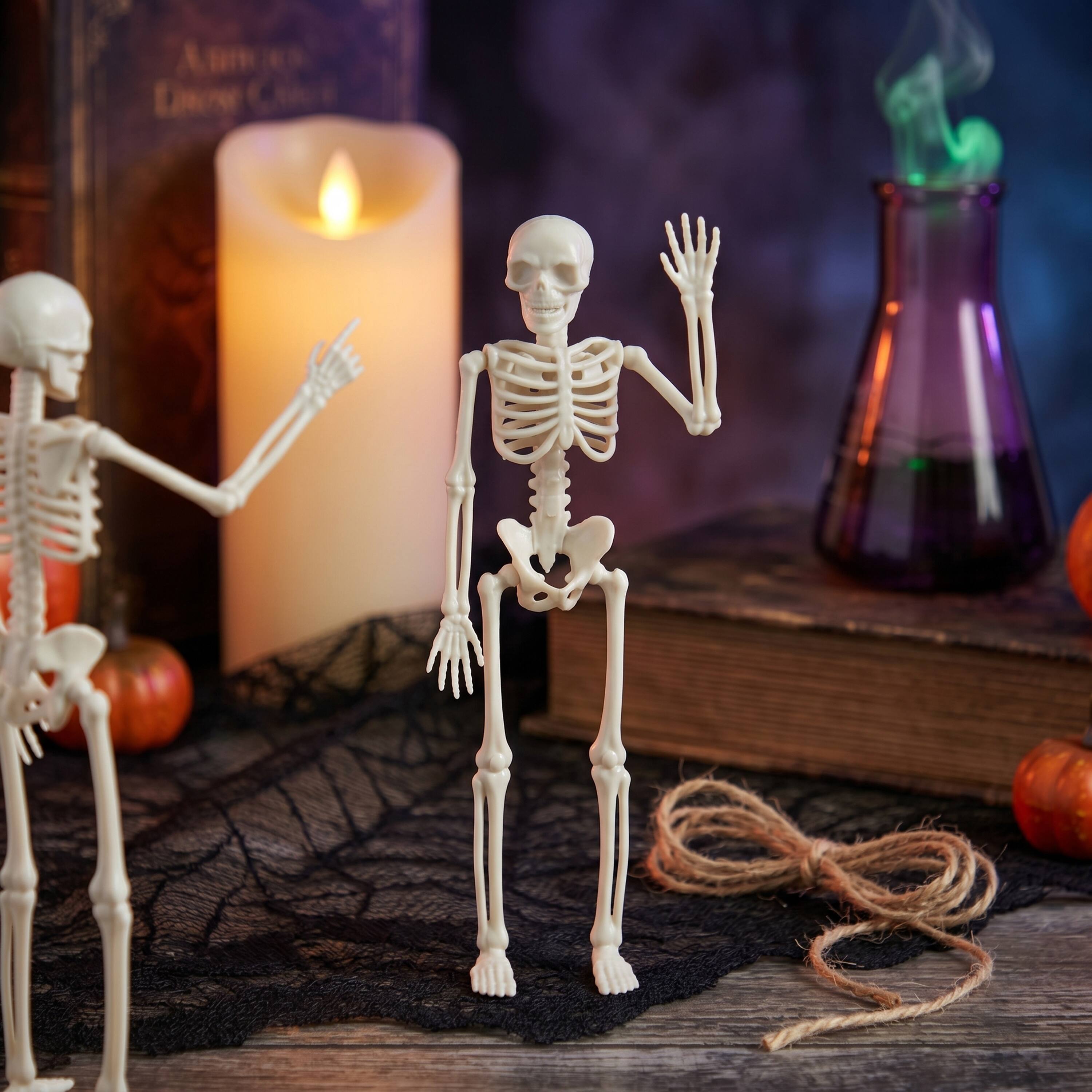 Alt View 3. Joyfy - 12 PCS Halloween Mini Skeleton Figurines, 6" Plastic Poseable Small Skeletons Toys Decorations for Haunted House Prop - White.