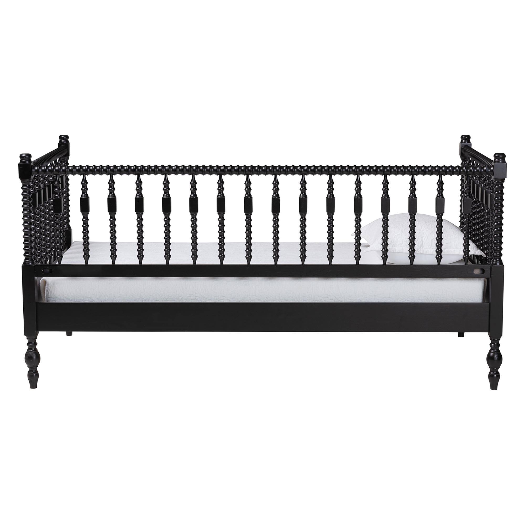 Left. Baxton Studio - Callison Spindle Daybed - Turned Farmhouse Sofa Bed with Spoked Frame Border, Twin - Black.