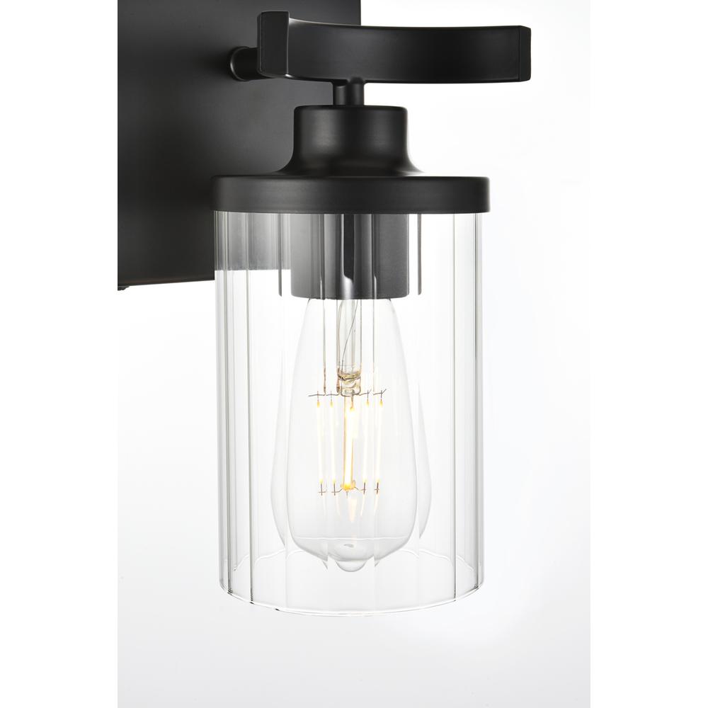 Angle. Living District - Saanvi 1 light Black and Clear Bath Sconce - Black And Clear.