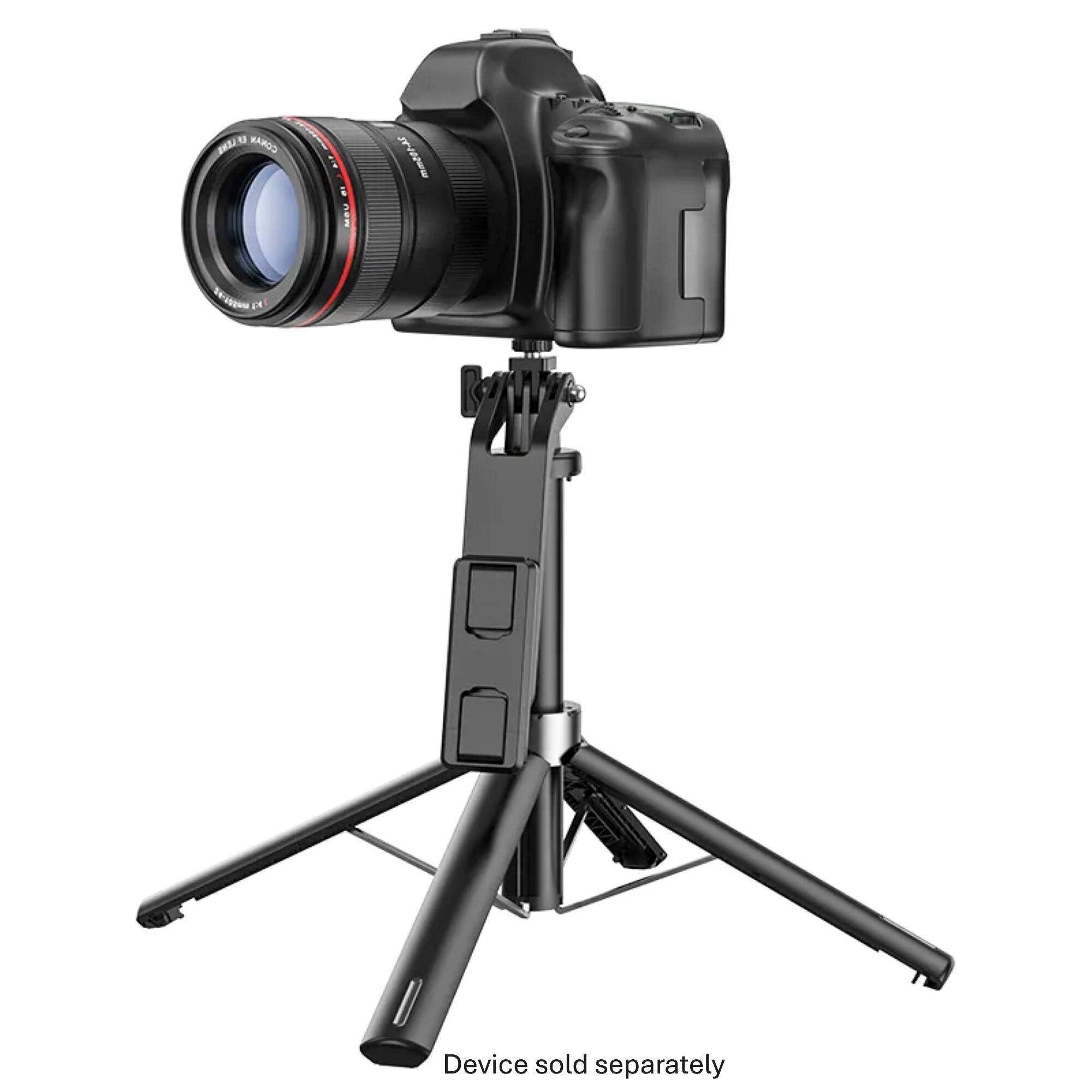The image features a camera tripod with a camera mounted on it. The tripod is black and silver, and the camera is positioned at the top of the tripod. The tripod is designed to hold a device, which is sold separately.