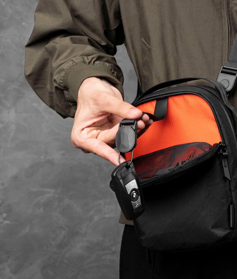 Alt View 4. ALPAKA - Metro Sling Max 3L Crossbody Sling Bag, Fits iPad Mini/Switch/Headphones, YKK AquaGuard Zippers - Black Ultradyne 100D.