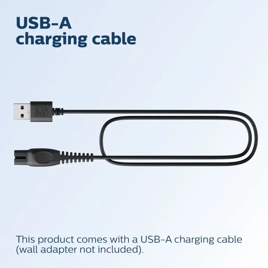 The image shows a USB-A charging cable with a black connector. The text on the image reads "This product comes with a USB-A charging cable (wall adapter not included)."