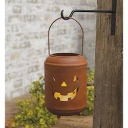 Left. BreeBe - Rusty Metal Jack O Lantern Luminary - Orange-Brown.