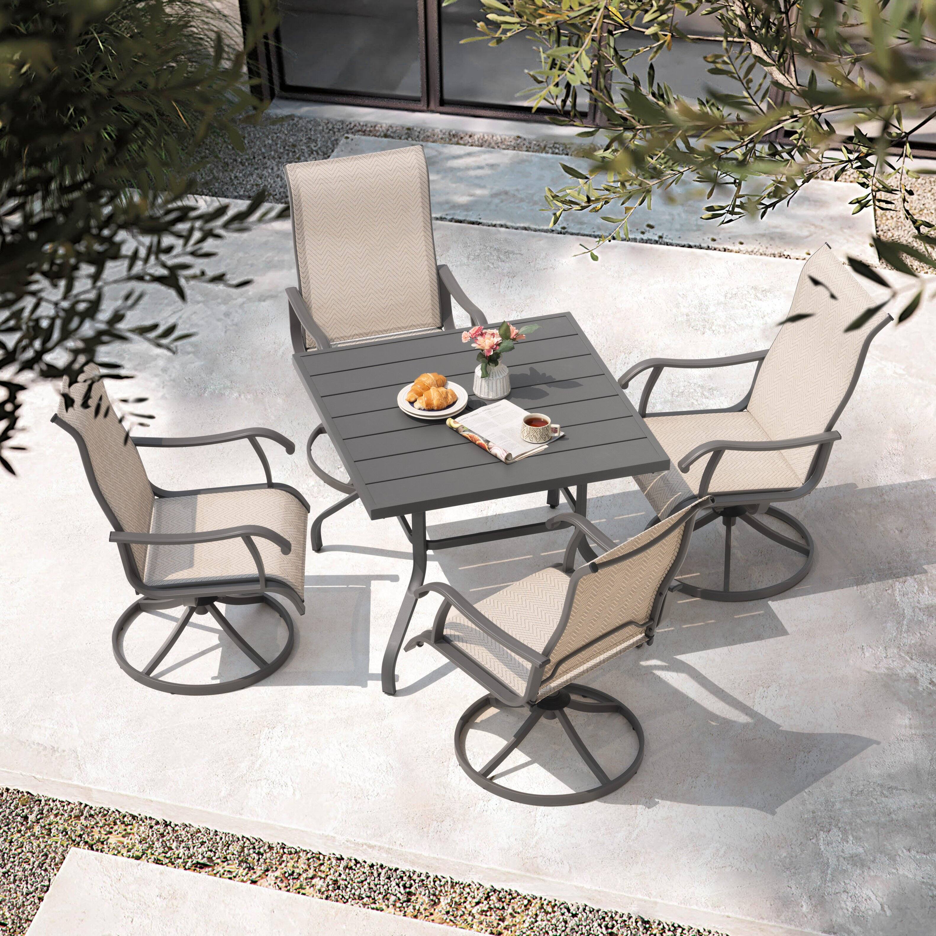Angle. Nuu Garden - Patio 5 Pieces Textilene Dining Set with Swivel Design, Umbrella Hole - Beige and Gray.