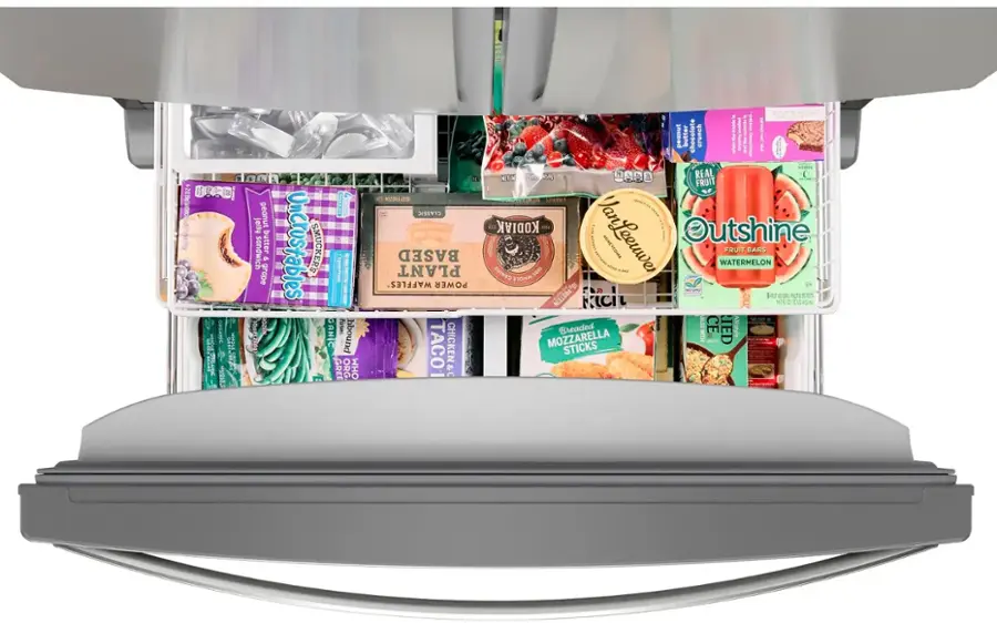The image features a refrigerator with a door open, revealing a variety of food items stored inside. The items include several bottles, a sandwich, and a bowl. The bottles are placed in different positions within the refrigerator, with some located near the top, middle, and bottom sections. The sandwich is placed in the middle of the refrigerator, while the bowl is located towards the right side. The refrigerator is filled with a diverse assortment of food, making it a well-stocked and convenient appliance for meal preparation.