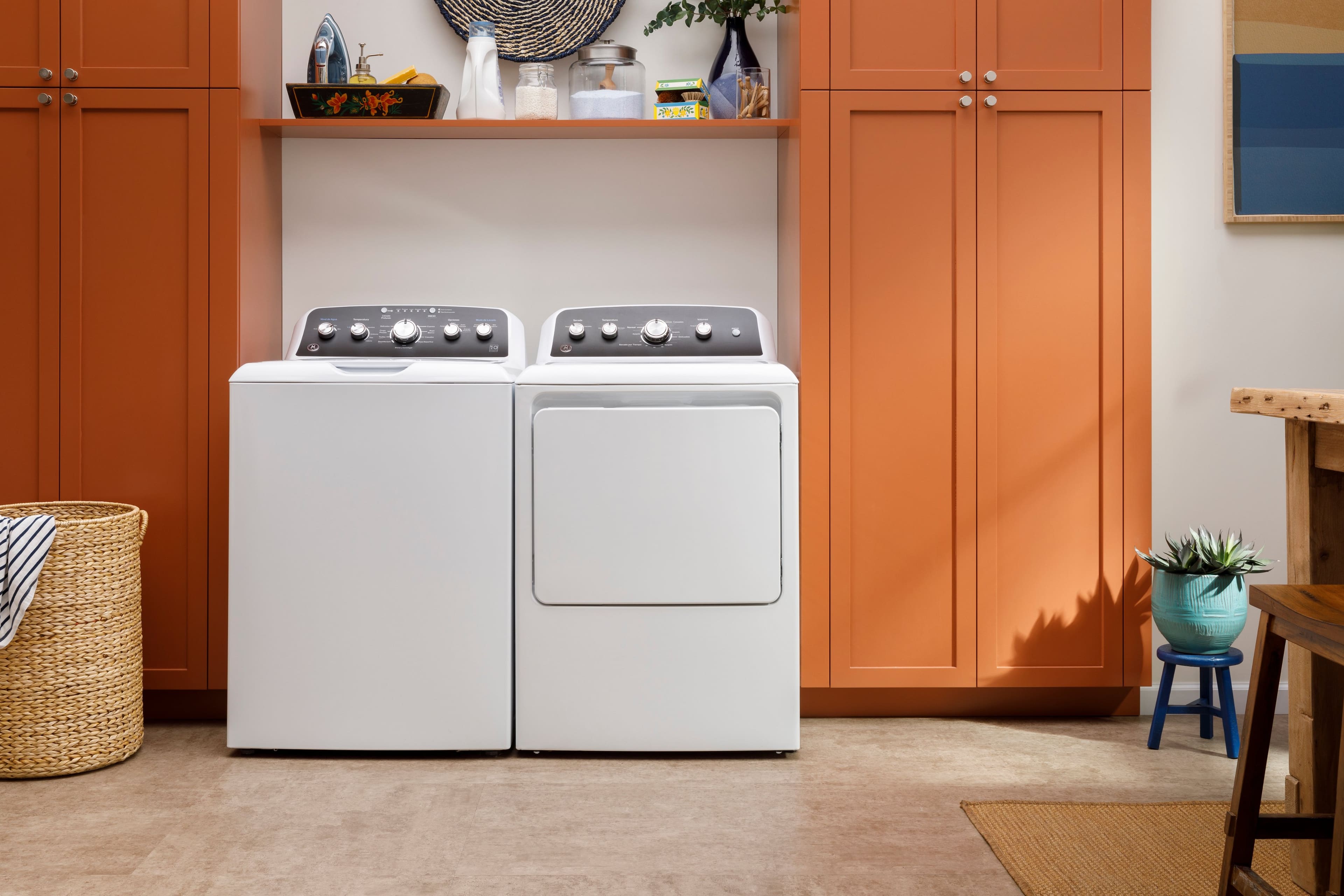 Alt View 14. GE - 4.5 Cu. Ft. High-Efficiency Top Load Washer with Spanish Control Panel - White with Matte Black.