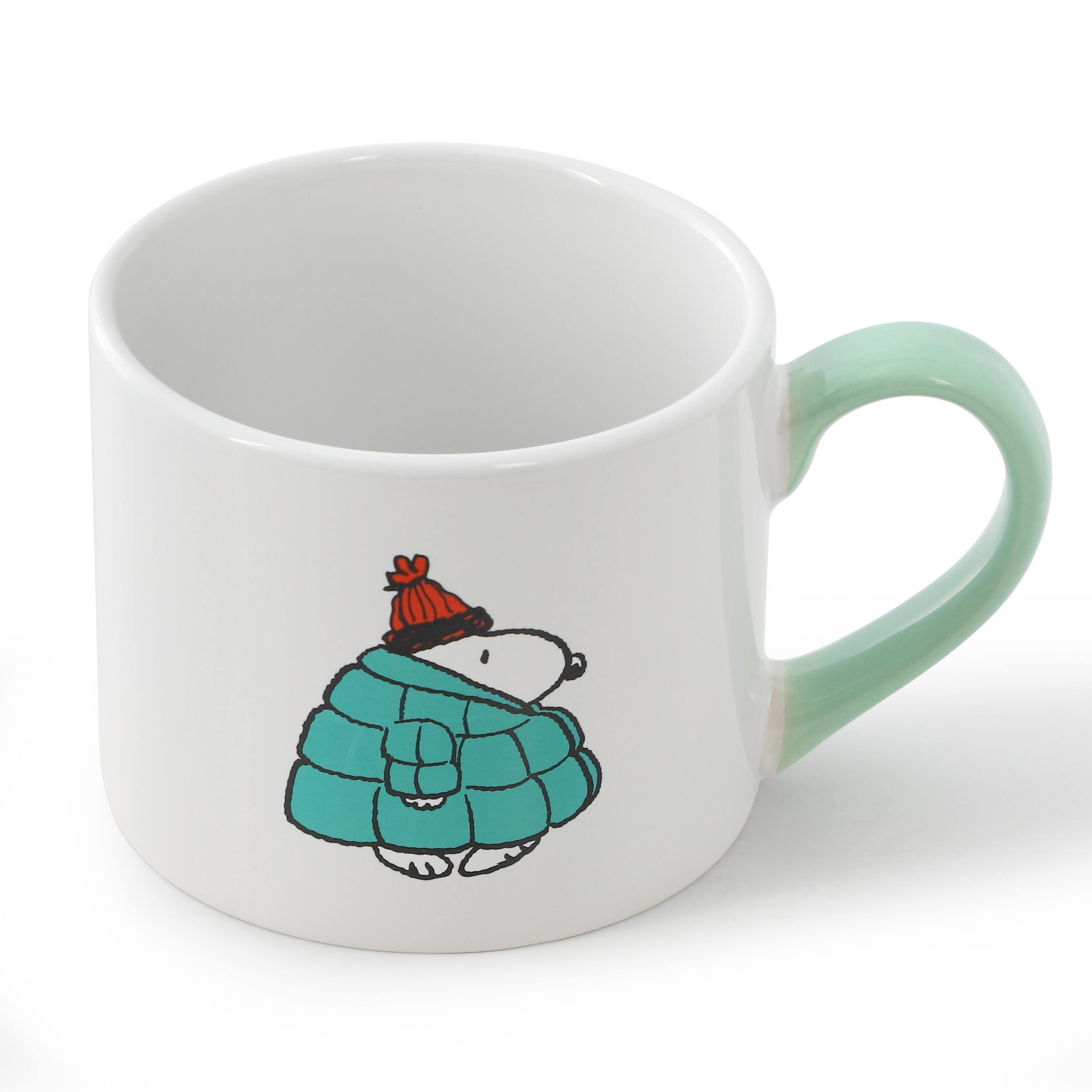 Angle. Peanuts - Peanuts All Bundled Up 4 Piece 19 Ounce Stackable Stoneware Mug Set in Mint - Mint.