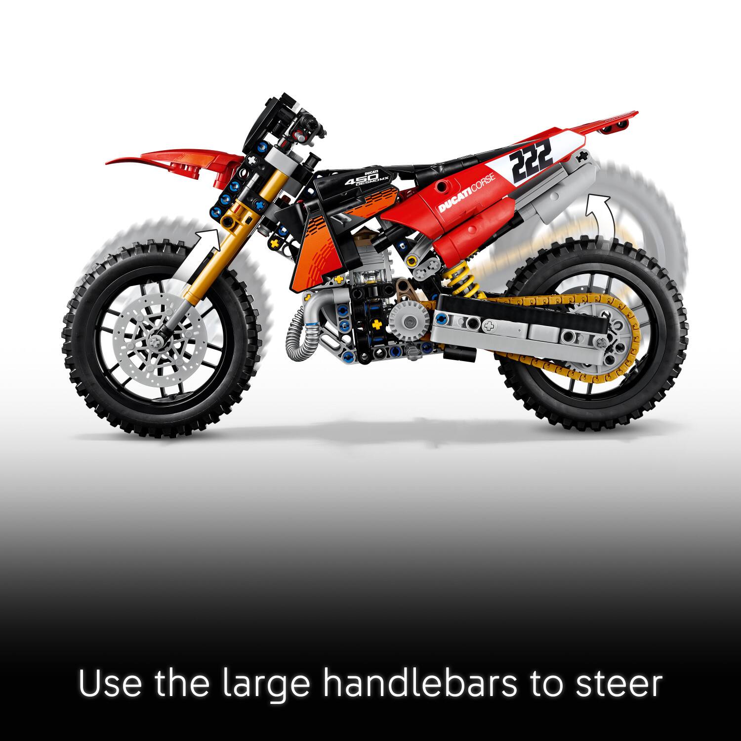 - ads 222 * DUCATICORSE J 2  
Use the large handlebars to steer