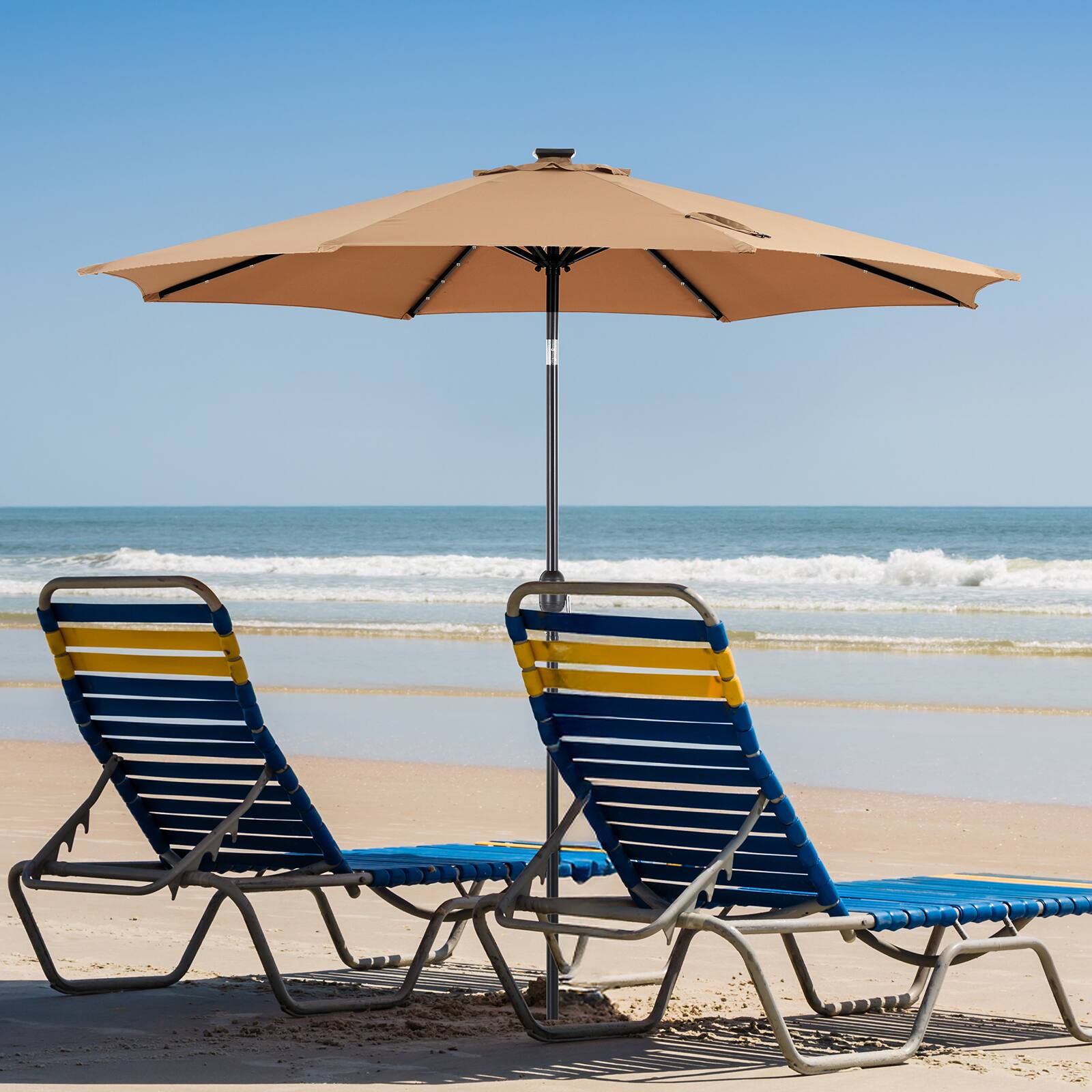 Angle. AENKYO - 10ft Solar Polyester 32 LED Lighted Patio Umbrella with Tilt Adjustment and UV-Resistant Fabric - Khaki.